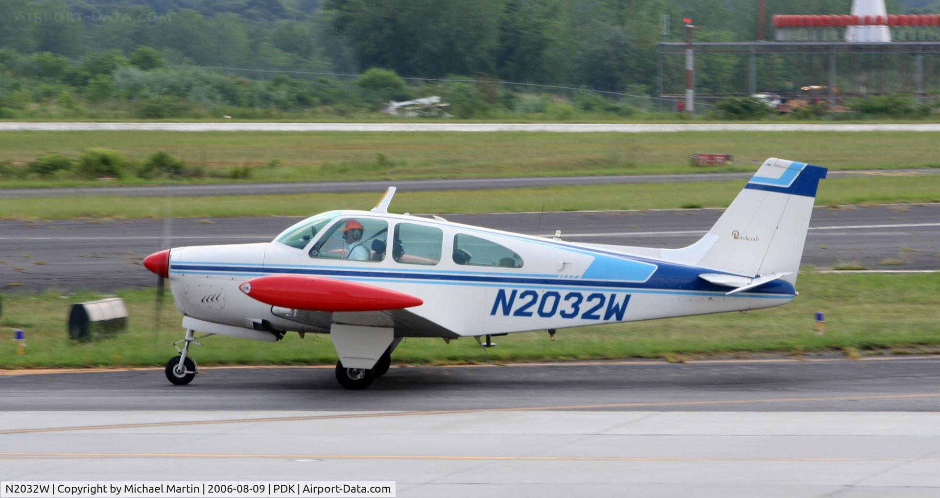 N2032W, 1965 Beech 35-C33 Debonair C/N CD-977, Taxing to tiedown