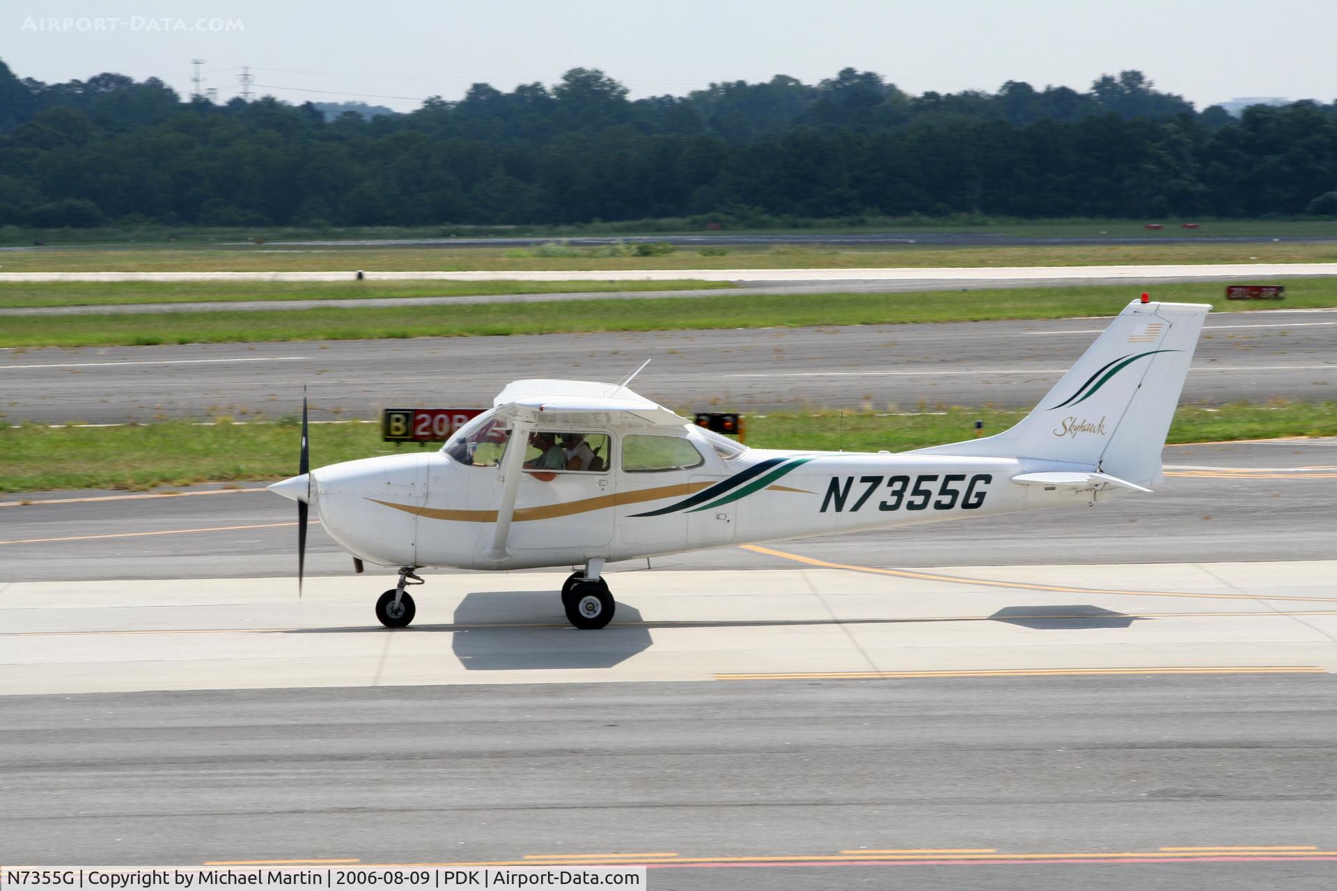 N7355G, 1970 Cessna 172K Skyhawk C/N 17259055, Taxing to tiedown