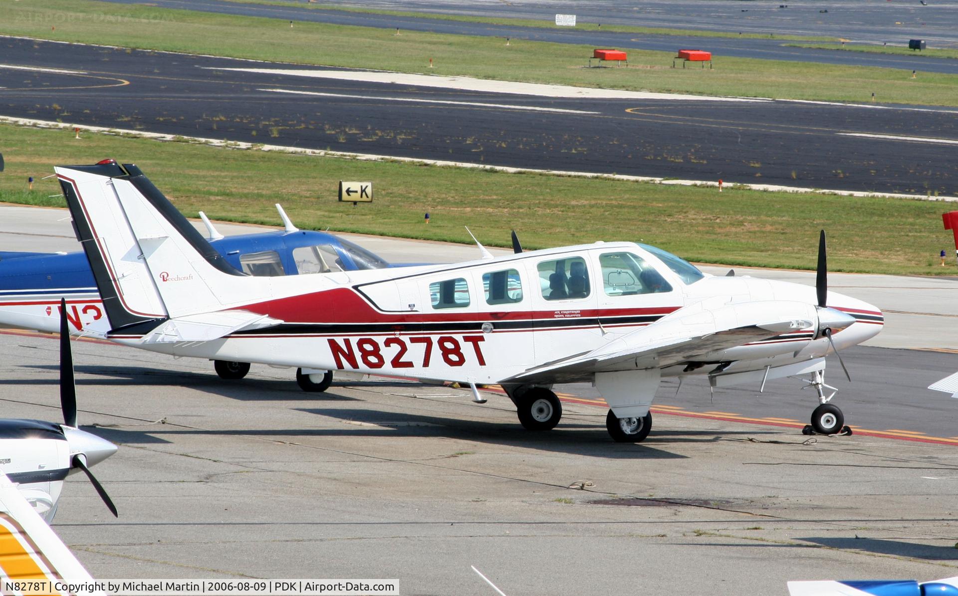 N8278T, 1992 Beech 58 Baron C/N TH-1672, Tied down @ Epps with other aircraft