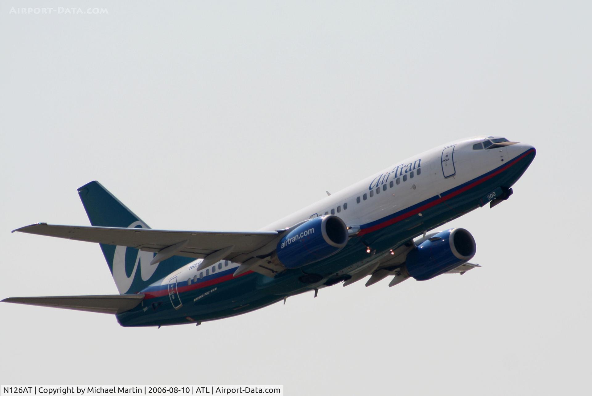 N126AT, 2004 Boeing 737-76N C/N 32679, Climbing off of runway 9L