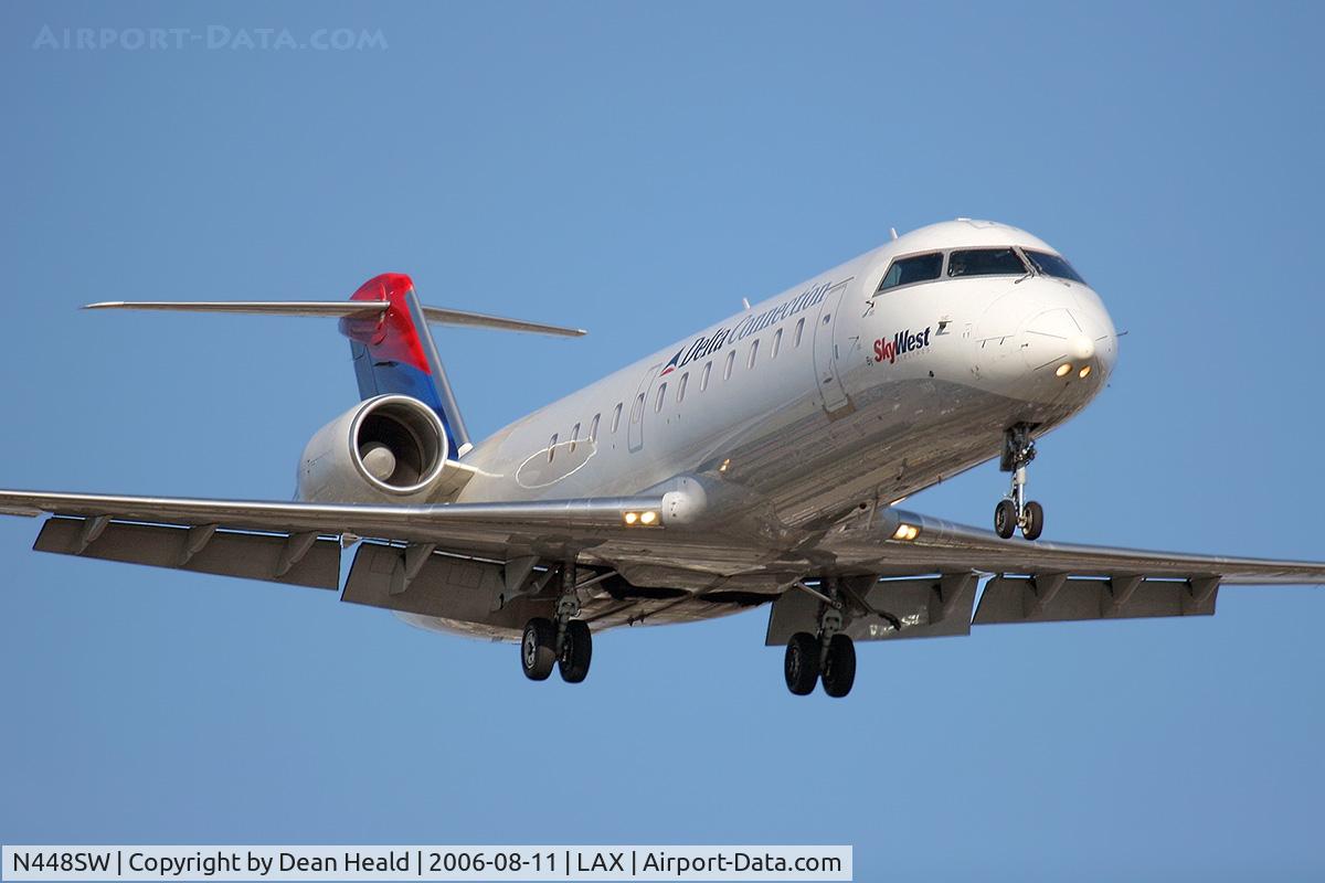 N448SW, 2002 Bombardier CRJ-200LR (CL-600-2B19) C/N 7678, Delta Connection (operated by SkyWest) N448SW (FLT SKW61Y) from Salt Lake City Int'l (KSLC) on final approach to RWY 24R.