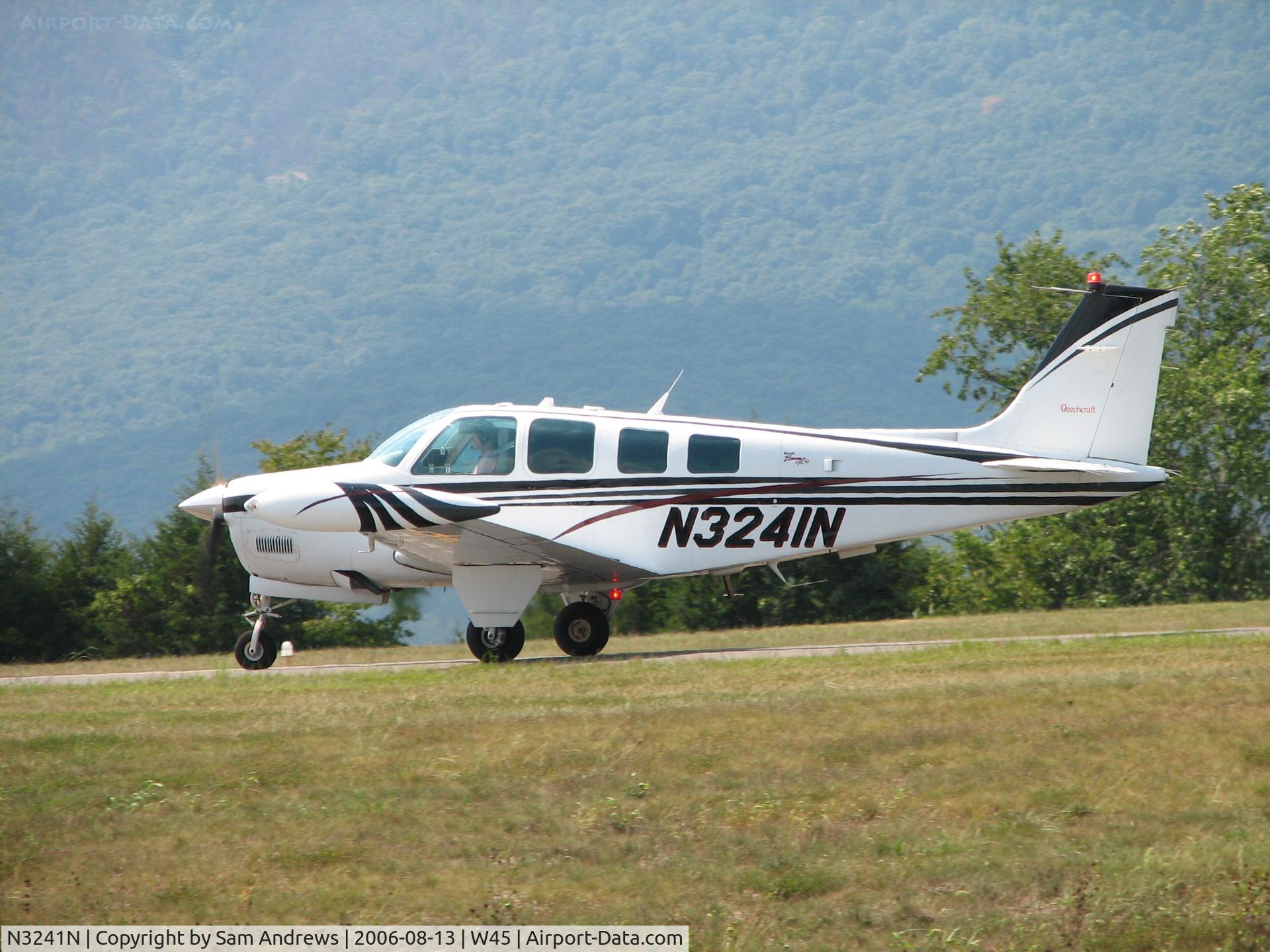 N3241N, 1999 Raytheon Aircraft Company A36 Bonanza C/N E-3241, In position and holding.  They were on their way to Manassas Regional Harry P Davis Field (KHEF)
