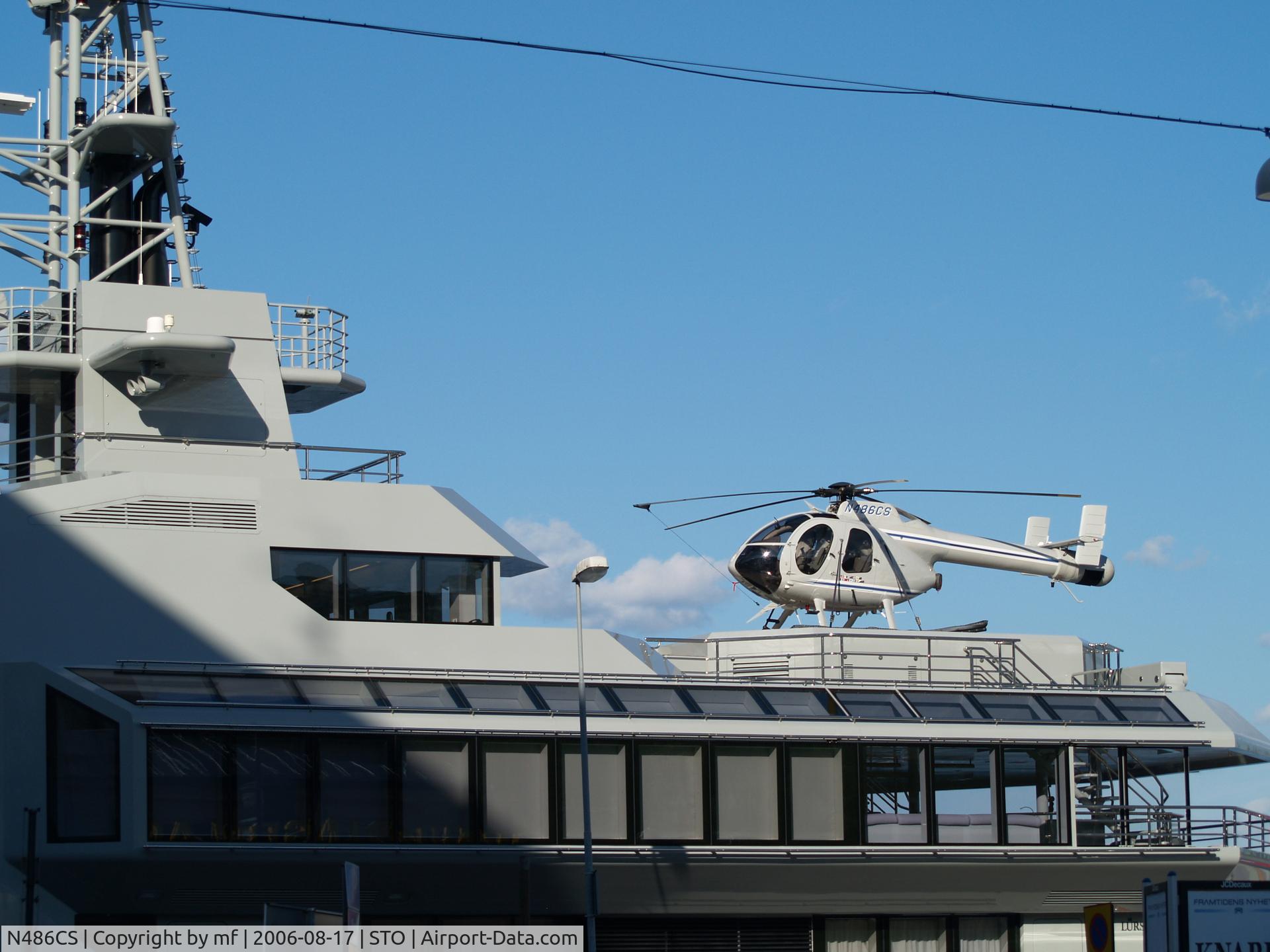N486CS, 1997 McDonnell Douglas 500N C/N LN083, N486CS on helipad of boat 