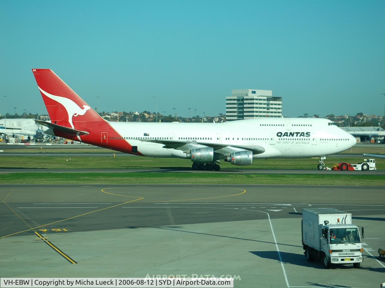 VH-EBW, 1986 Boeing 747-338 C/N 23408, Qantas' B747-300 (VH-EBW) being towed to the gate