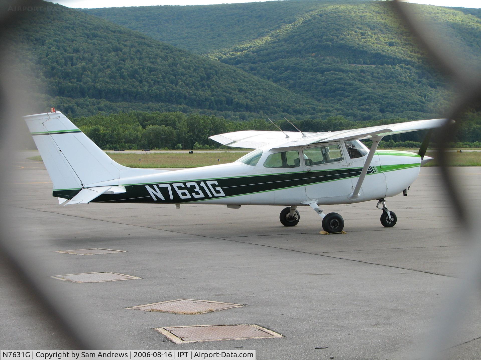 N7631G, 1970 Cessna 172L C/N 17259331, through the fence.