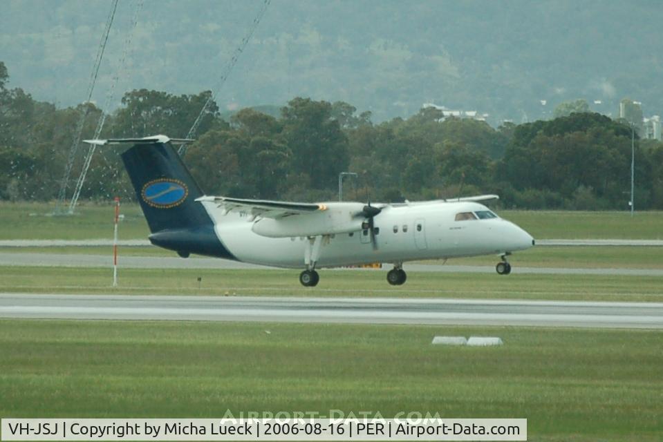 VH-JSJ, 1989 De Havilland Canada DHC-8-103 Dash 8 C/N 170, Seconds before touch-down