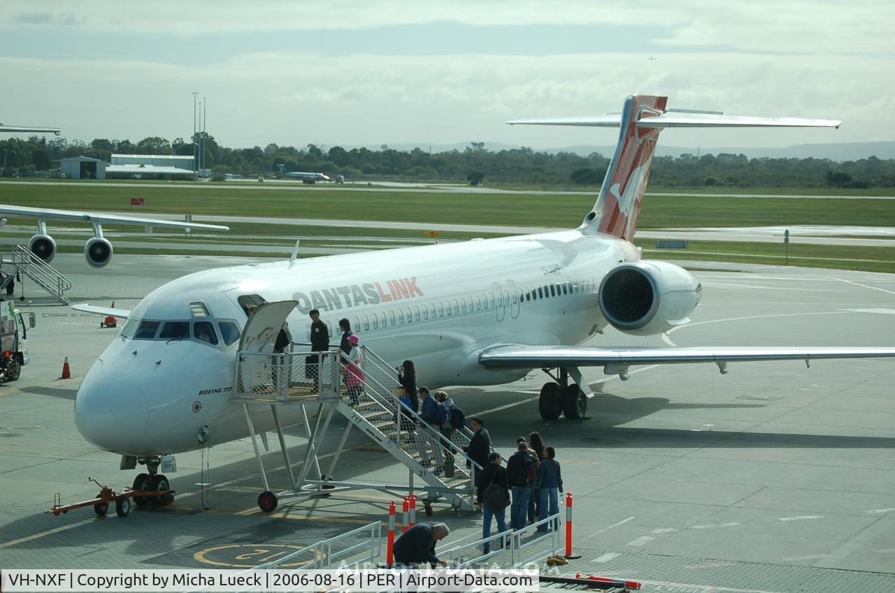 VH-NXF, 1999 Boeing 717-2BD C/N 55001, Boarding for the flight to Alice Springs