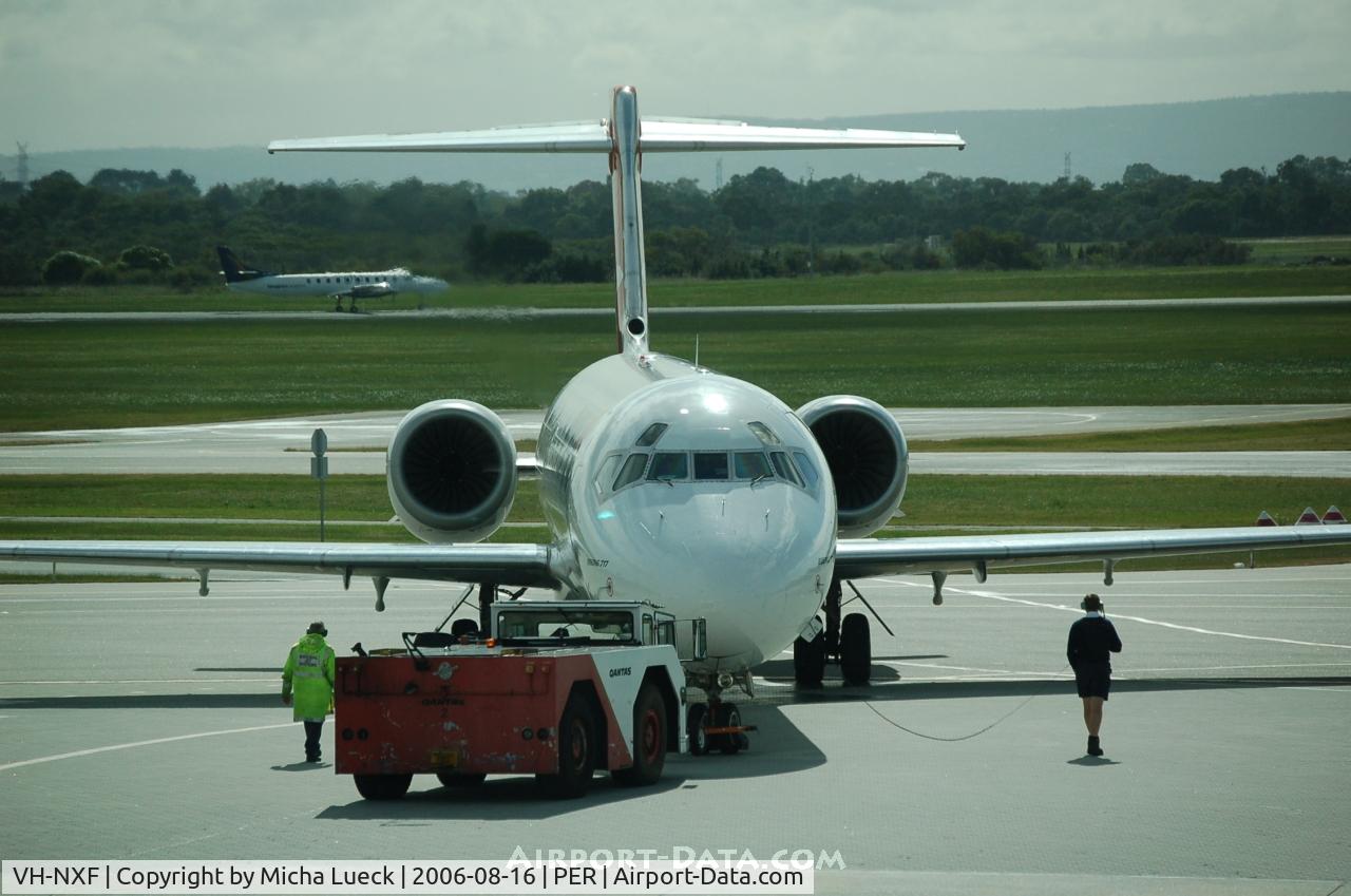 VH-NXF, 1999 Boeing 717-2BD C/N 55001, Push-back in Perth