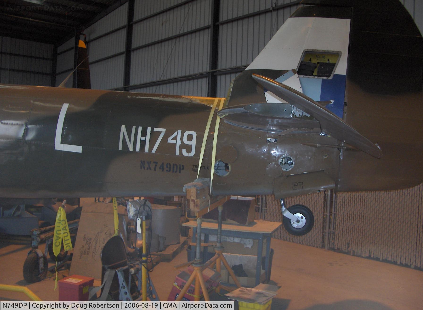 N749DP, 1945 Supermarine Spitfire XIV C/N 6S/583887, In restoration as NX749DP-1945 Vickers/Supermarine SPITFIRE MK XIVe, Rolls Royce Griffon 65 2,050 Hp V-12, the high altitude design Mk XIVe has more power, a cut down dorsal fuselage and larger fin and rudder