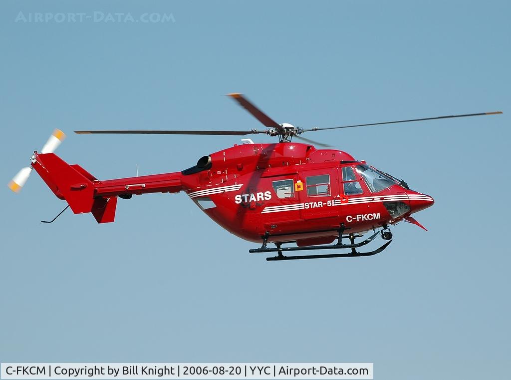 C-FKCM, 1983 Eurocopter-Kawasaki BK-117A-3 C/N 7002, About to land at FBO apron.