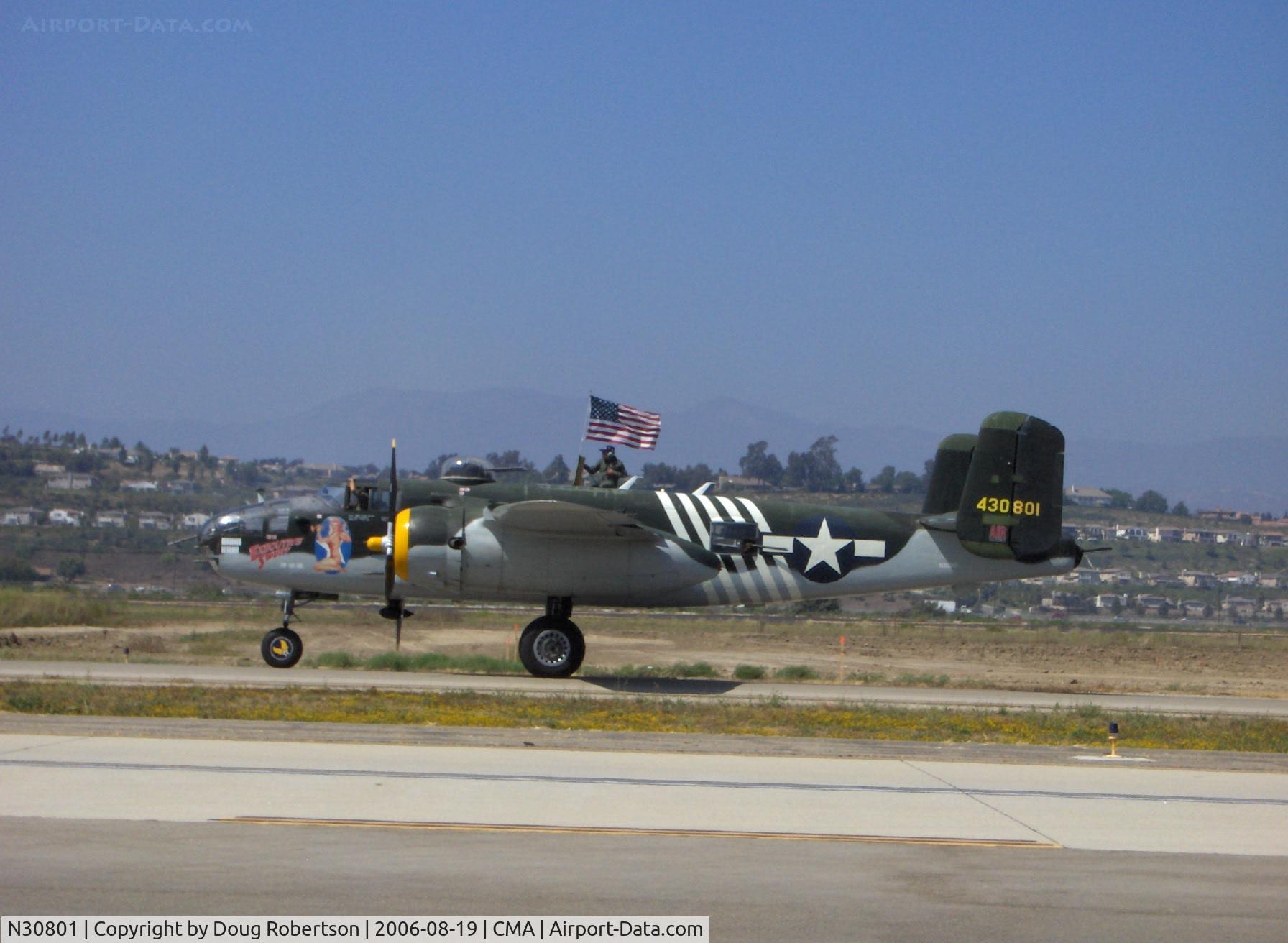 N30801, 1944 North American TB-25N Mitchell C/N 108-34076, 1944 North American B-25J MITCHELL 'Executive Sweet', two Wright R-2600s 1,700 Hp each, taxi (flag about to be taken down) to Runway 26