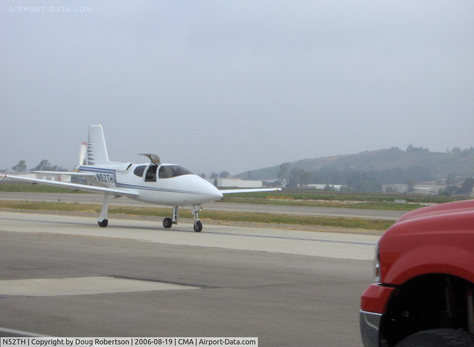 N52TH, 1999 Cirrus VK-30 C/N 143, 1999 Hastings CIRRUS VK-30, Continental IO-550 pusher and tri-blade 76 inch prop, taxi after landing Runway 26