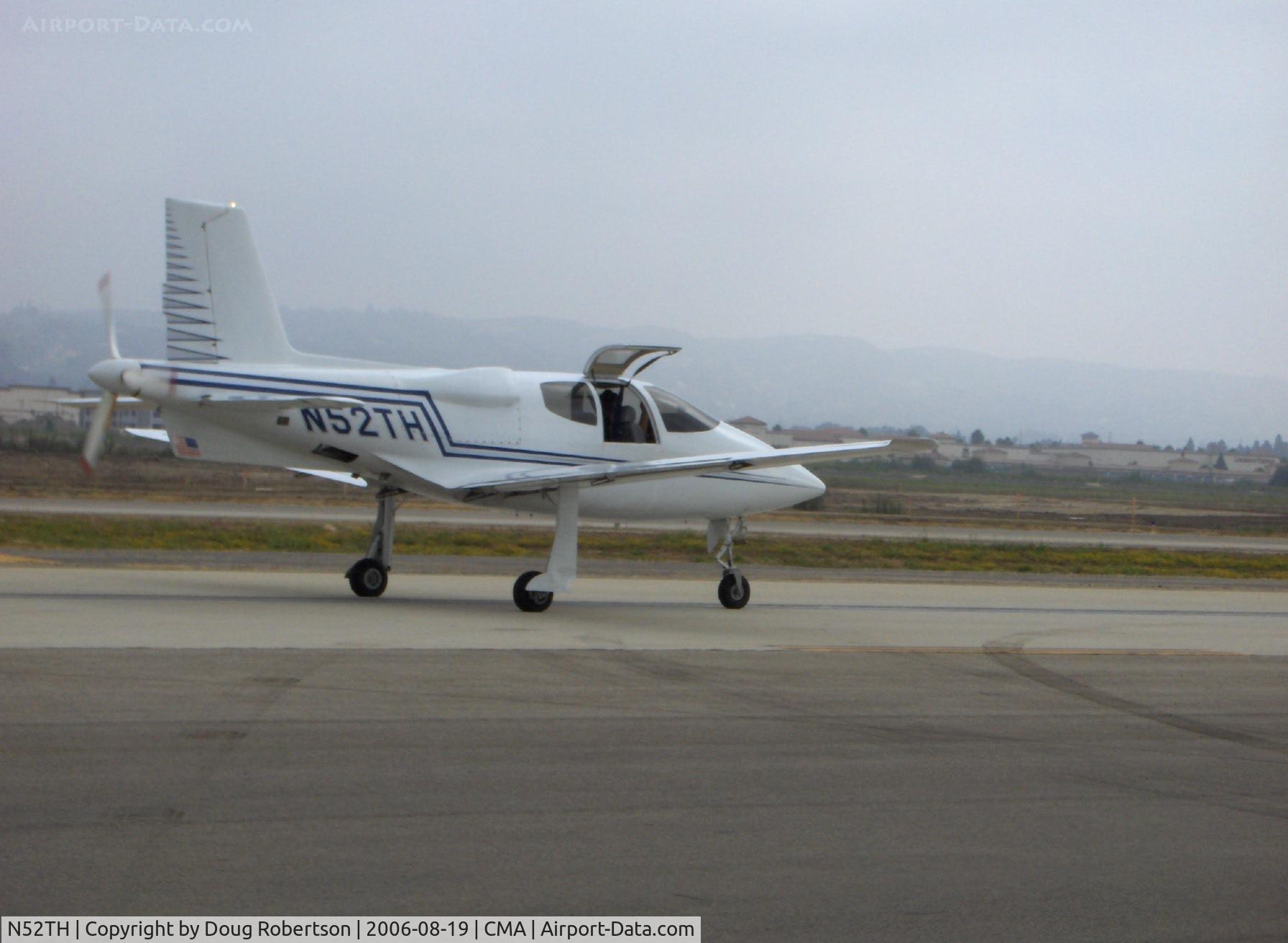 N52TH, 1999 Cirrus VK-30 C/N 143, 1999 Hastings CIRRUS VK-30, Continental IO-550 pusher and tri-blade 76 inch prop, taxi after landing Runway 26