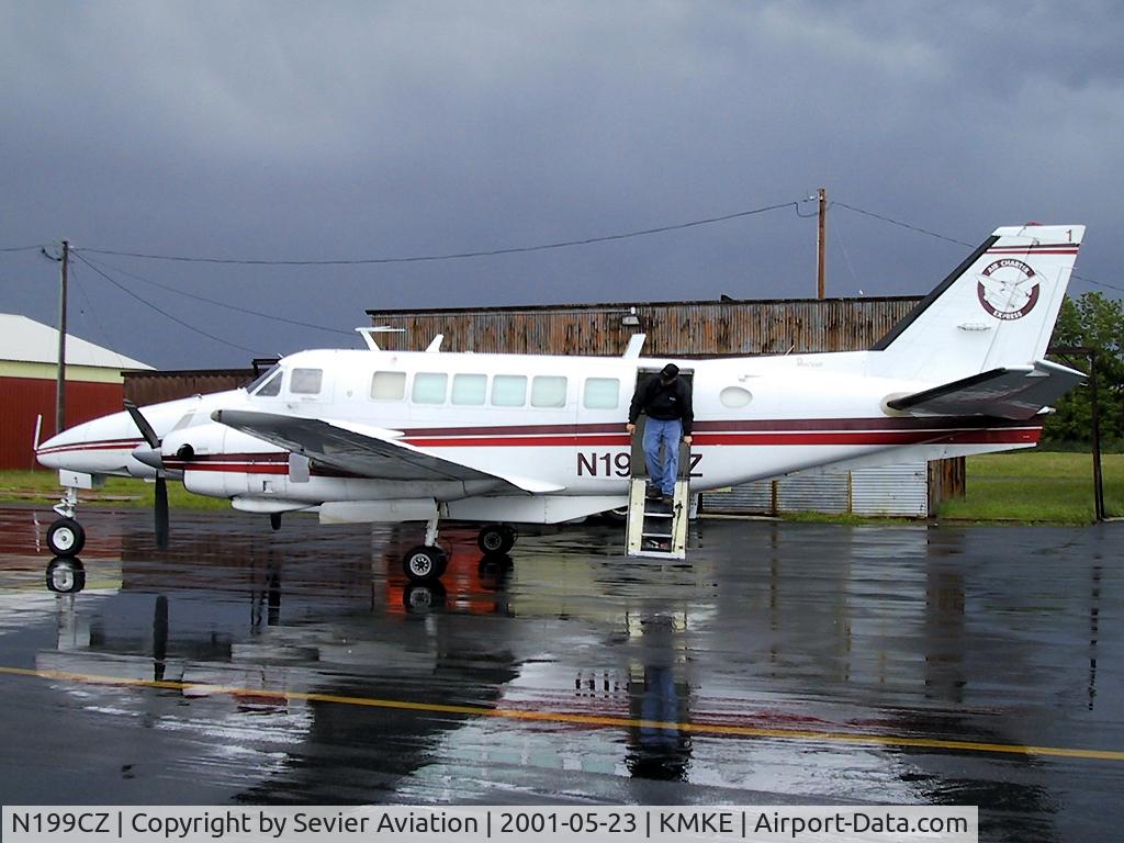 N199CZ, 1968 Beech 99 C/N U-30, Rain on the ramp!