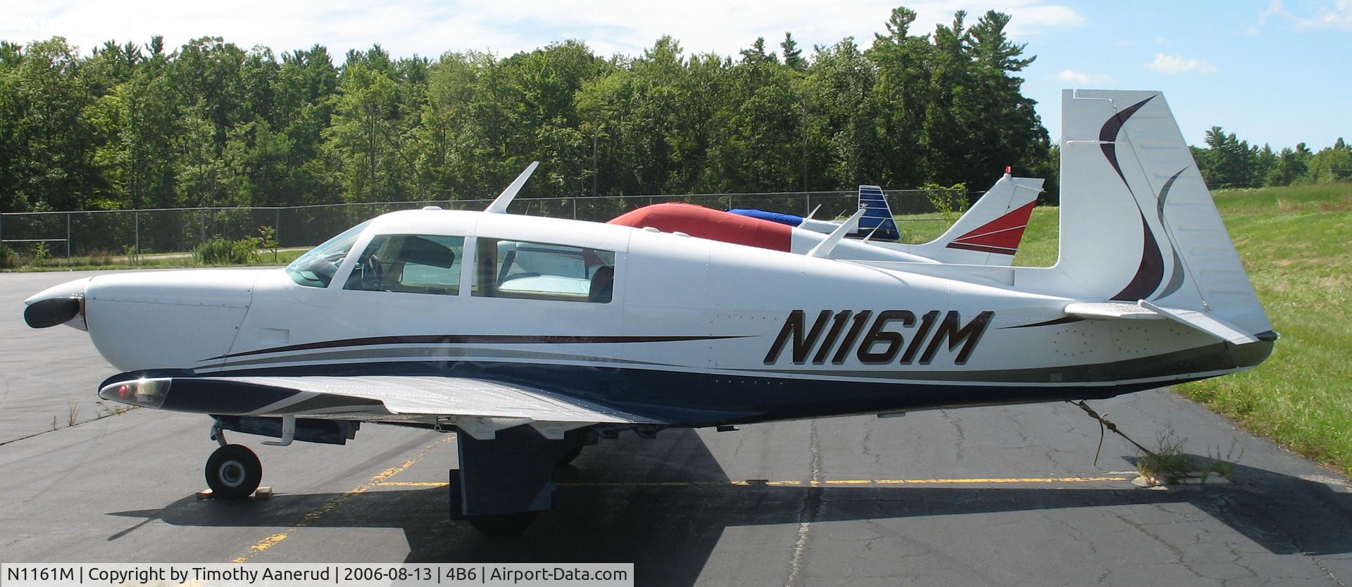 N1161M, 1982 Mooney M20K C/N 25-0657, Parked at the ramp at Ticonderoga