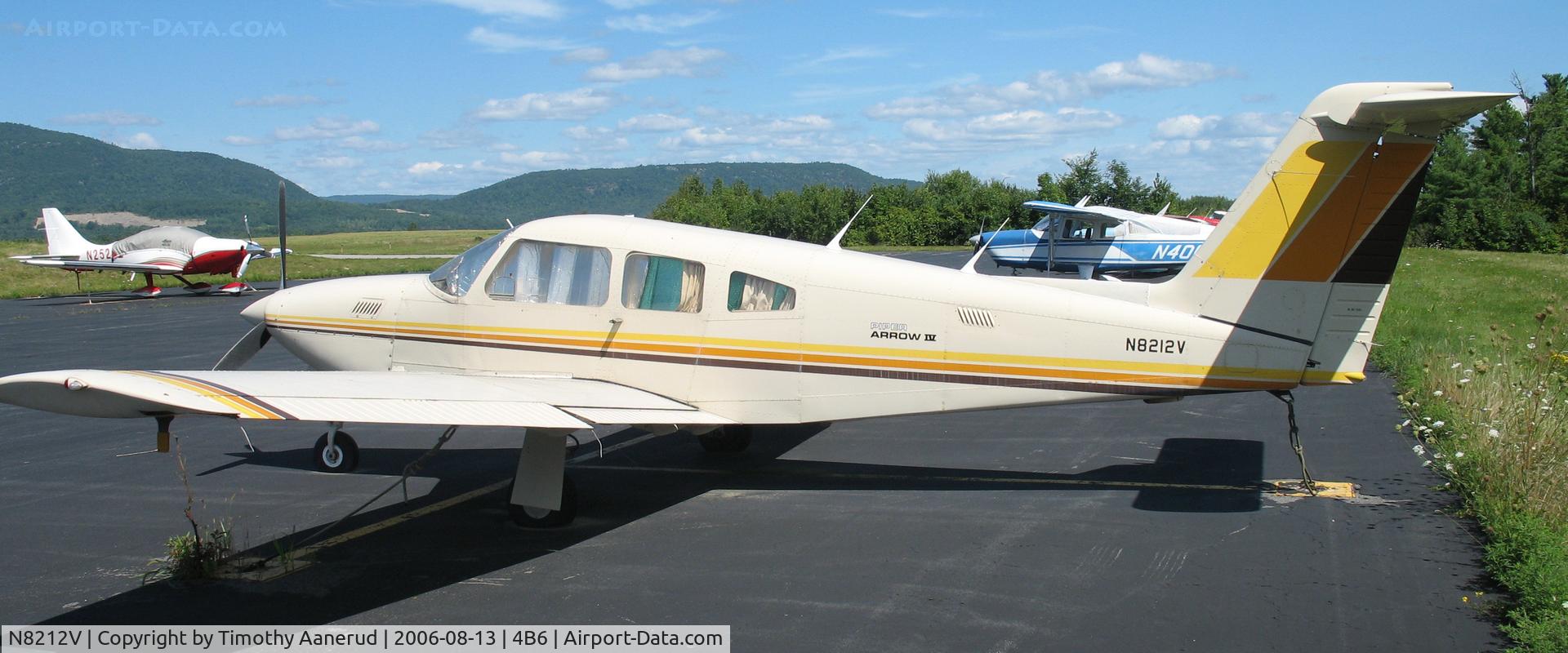 N8212V, 1980 Piper PA-28RT-201T Arrow IV C/N 28R-8031105, Parked at the ramp at Ticonderoga