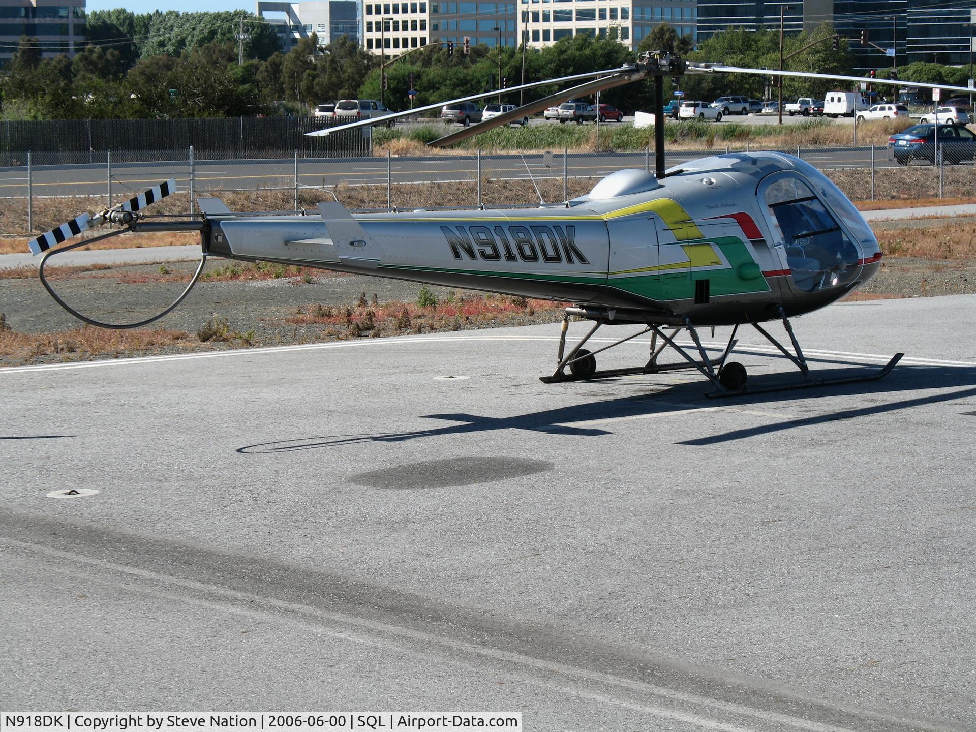N918DK, Enstrom F-28F Falcon C/N 755, Colorful 1988 Enstrom F28F @ San Carlos Municipal Airport, CA