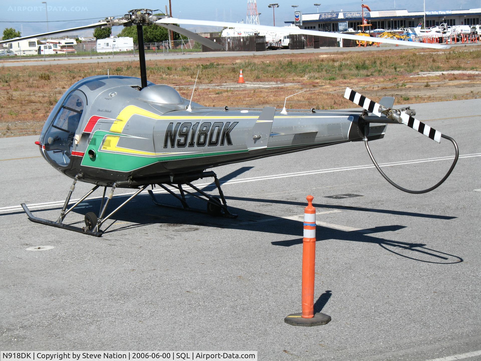 N918DK, Enstrom F-28F Falcon C/N 755, Colorful 1988 Enstrom F28F @ San Carlos Municipal Airport, CA