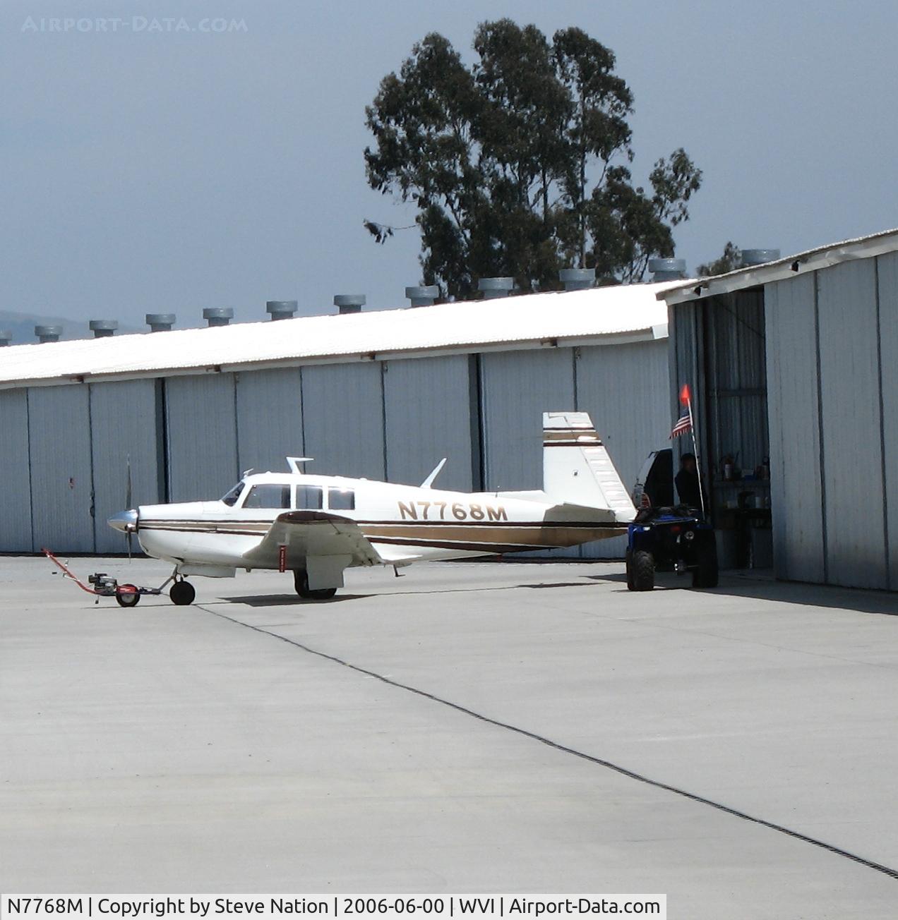 N7768M, 1974 Mooney M20F Executive C/N 22-0024, Distant shot of 1974 Mooney M20F @ Watsonville Municipal Airport, CA