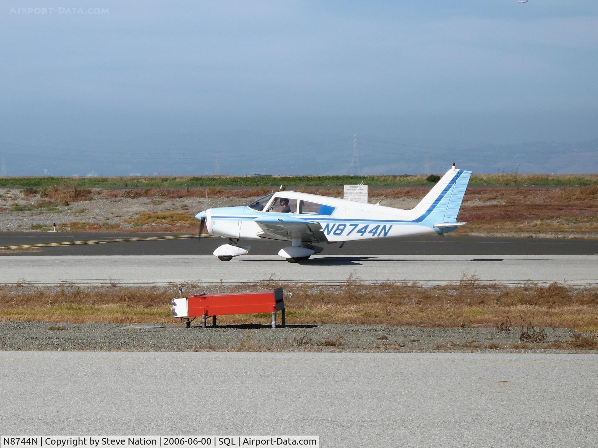 N8744N, 1969 Piper PA-28-140 C/N 28-25558, 1969 Piper PA-28-140 taking-off @ San Carlos Municipal Airport, CA