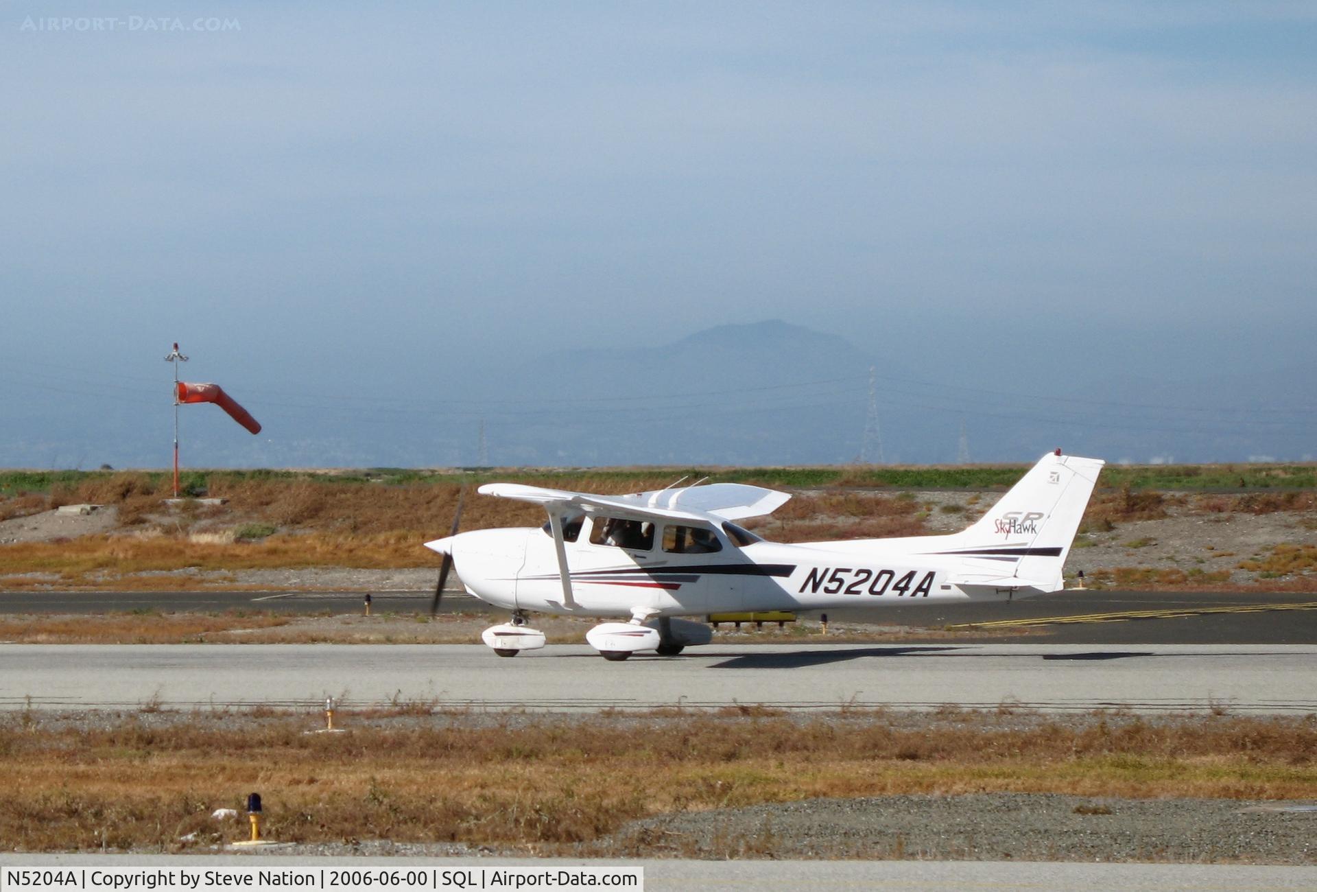 N5204A, 2002 Cessna 172S C/N 172S9101, Looking Up LLC 2002 Cessna 172S taking-off @ San Carlos Municipal Airport, CA