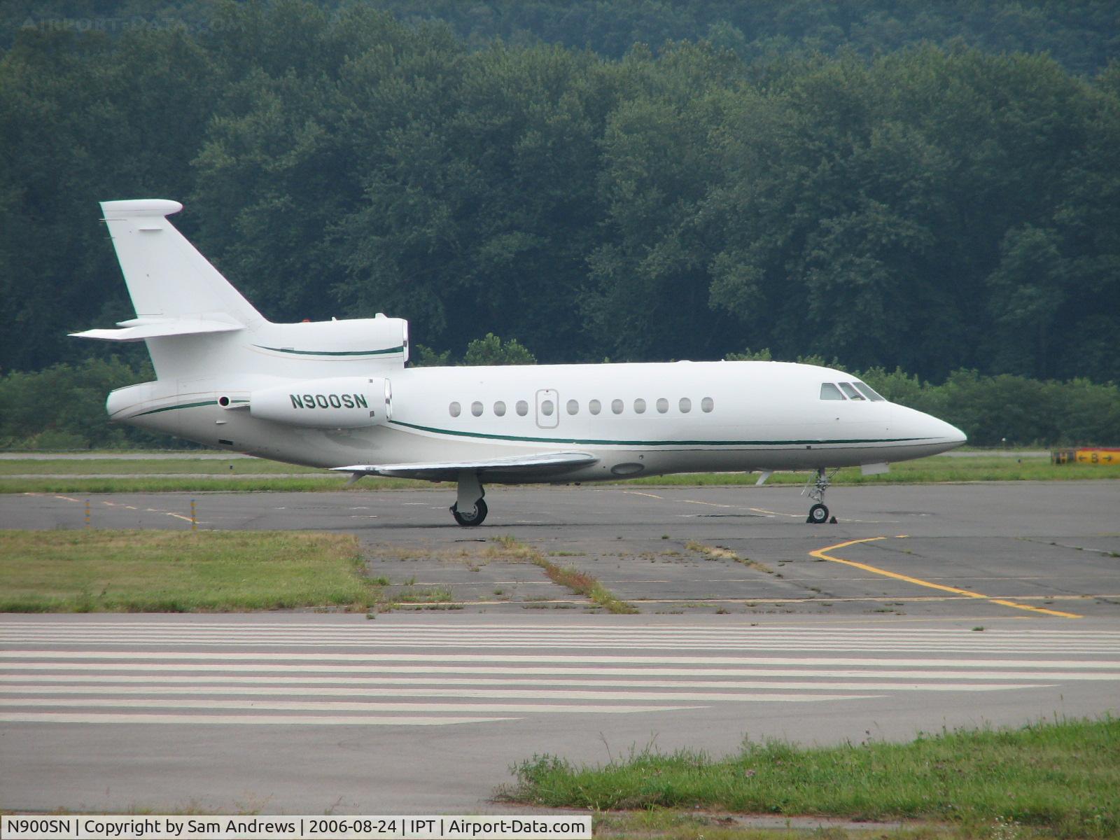 N900SN, 2002 Dassault Falcon 900EX C/N 117, Just sitting.  It is always amazing to me the number of big corporate aircraft that fly into our little airport.