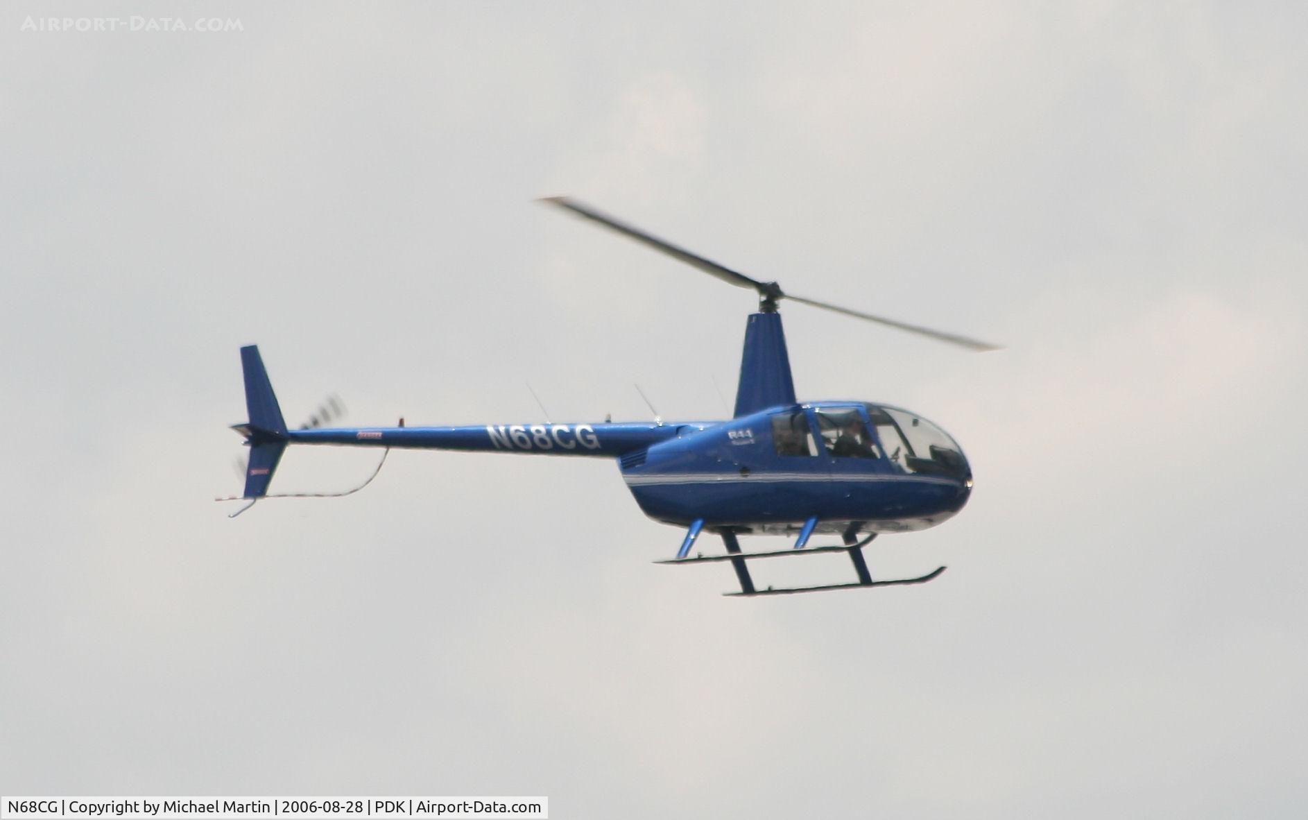 N68CG, 2006 Robinson R44 II C/N 11312, Over flying PDK