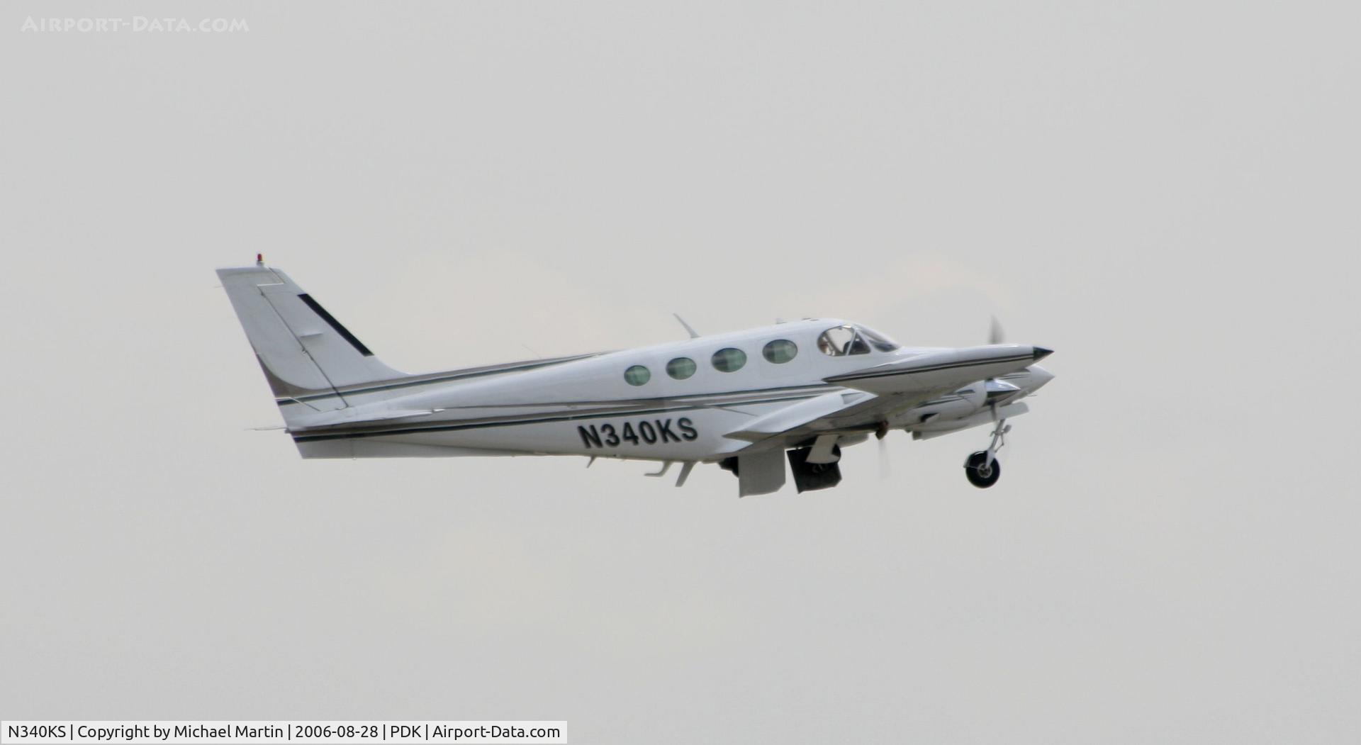 N340KS, 1981 Cessna 340A C/N 340A1501, Departing 20L - Gear Up!