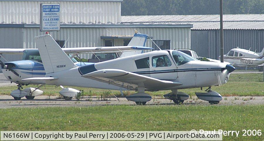 N6166W, 1964 Piper PA-28-140 Cherokee C/N 28-20184, Taxiing down the parking apron for a flight, getting some air in the door