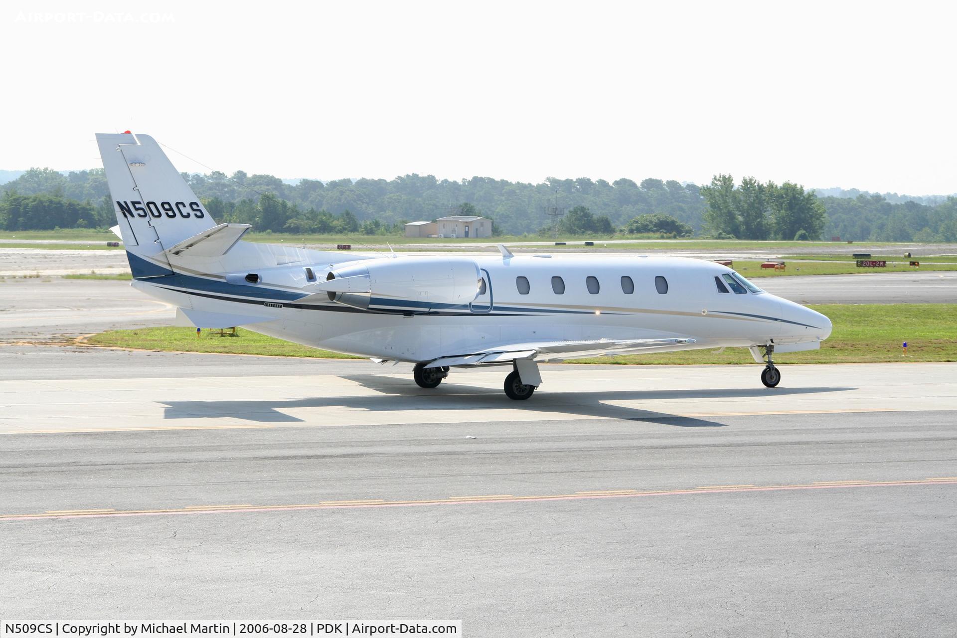 N509CS, 2003 Cessna 560XL Citation Excel C/N 560-5310, Taxing past Mercury Air Service