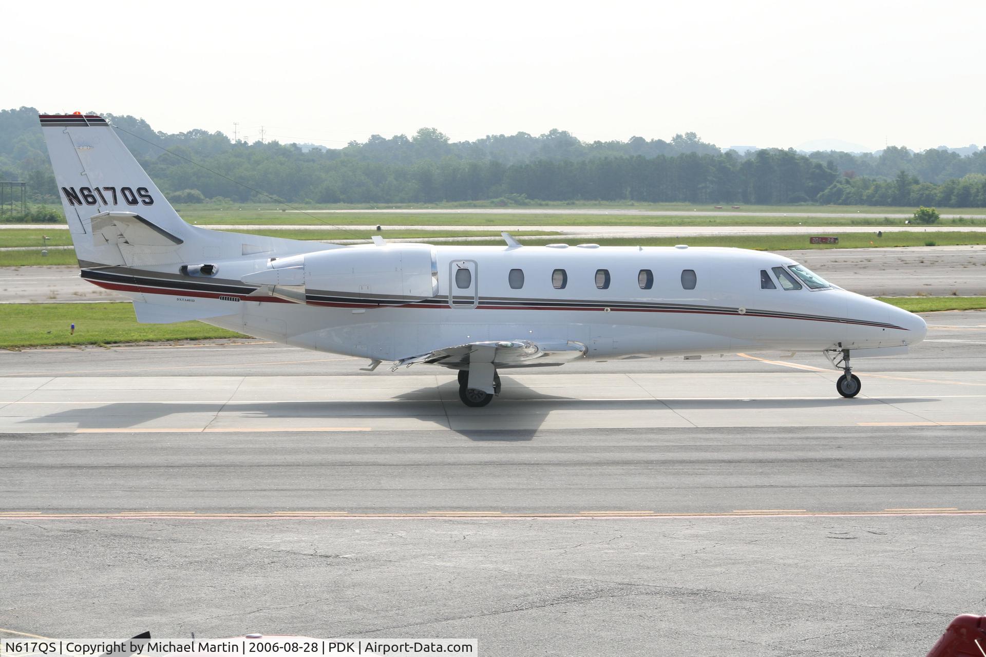 N617QS, 2004 Cessna 560XL Citation XLS C/N 560-5509, Taxing past Mercury Air Service