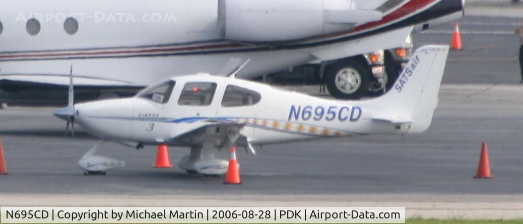 N695CD, 2005 Cirrus SR22 C/N 1372, Tied down @ Signature Flight Services