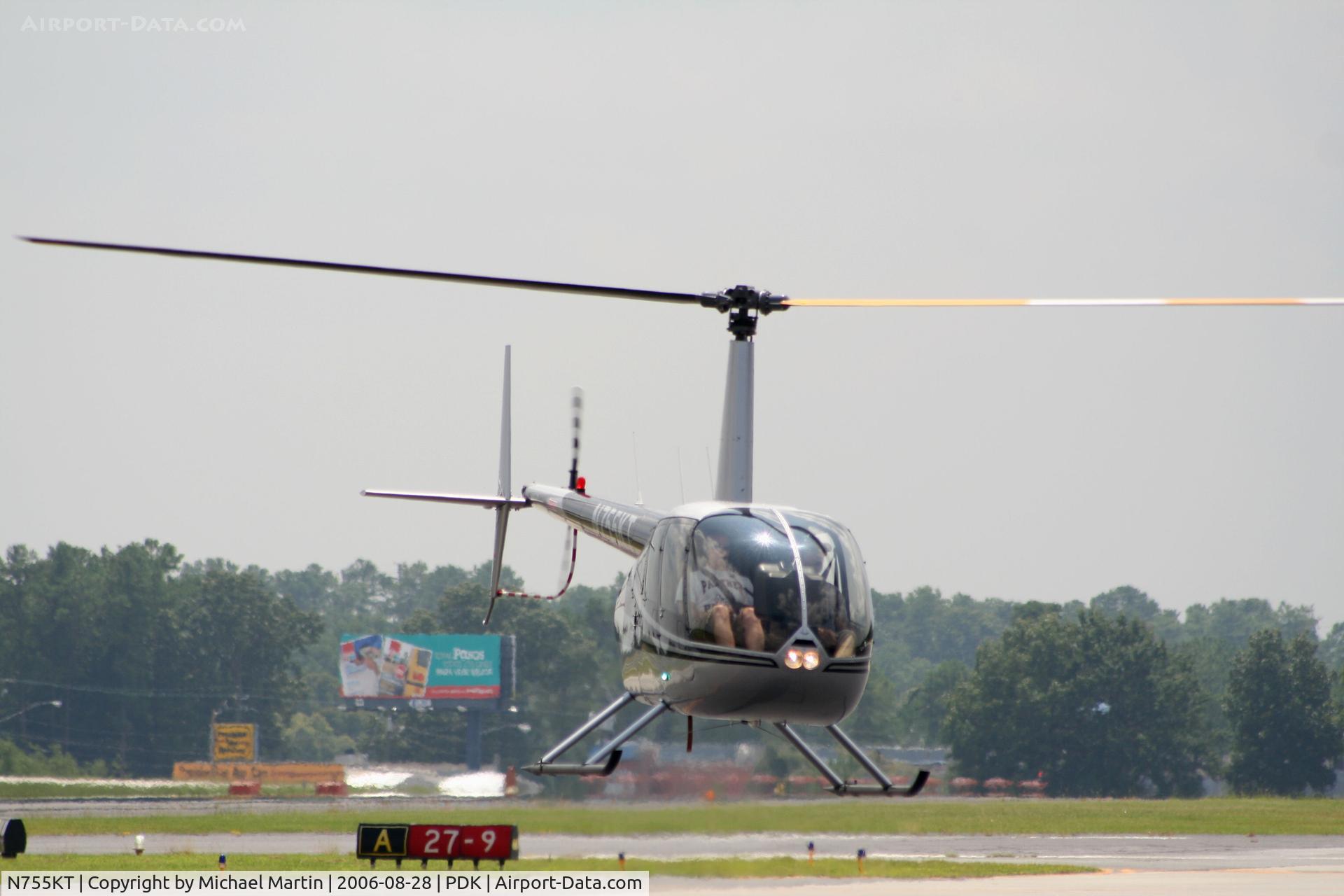 N755KT, 2004 Robinson R44 II C/N 10294, Landing at Mercury Air Center