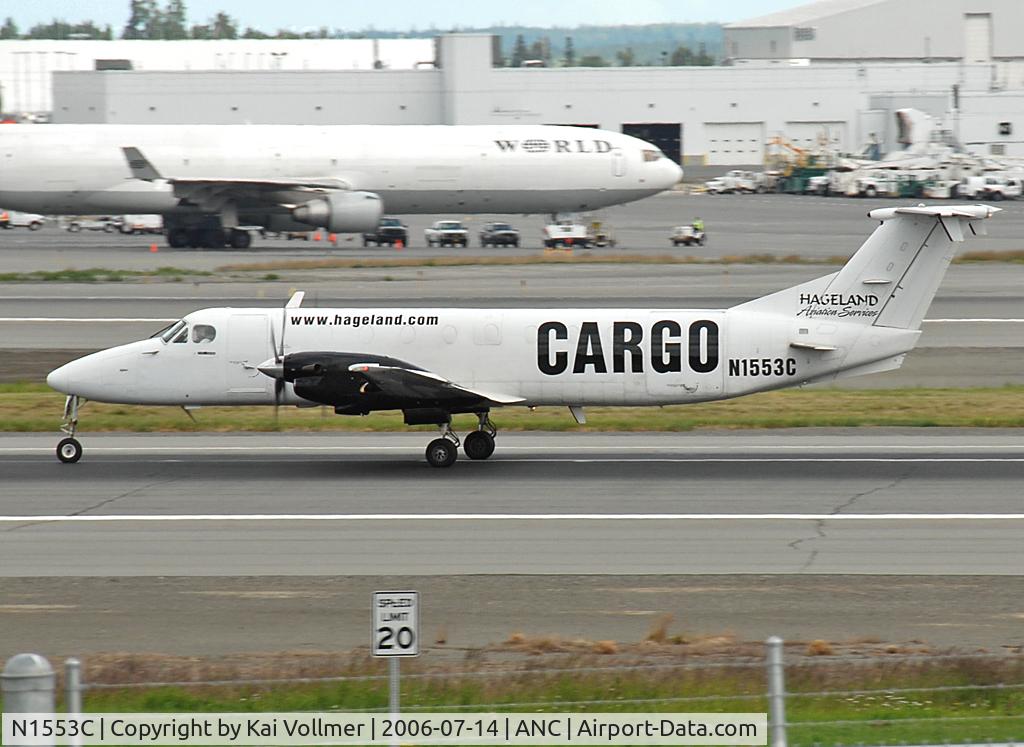 N1553C, 1988 Beech 1900C C/N UC-24, taking off Rwy 24L