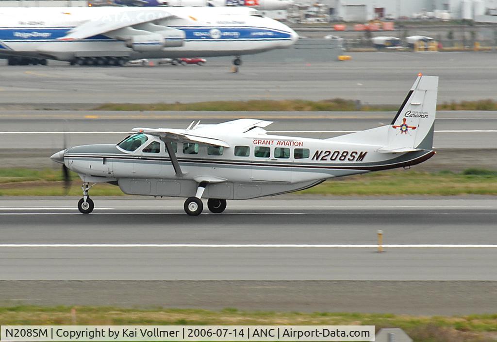 N208SM, 1999 Cessna 208B Grand Caravan C/N 208B-0749, taking off Rwy 24L