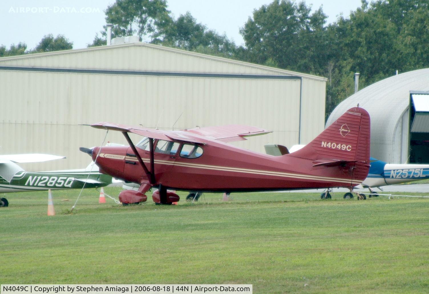 N4049C, 1949 Universal Stinson 108-3 C/N 108-5049, A real beauty...Stinson on the grass.