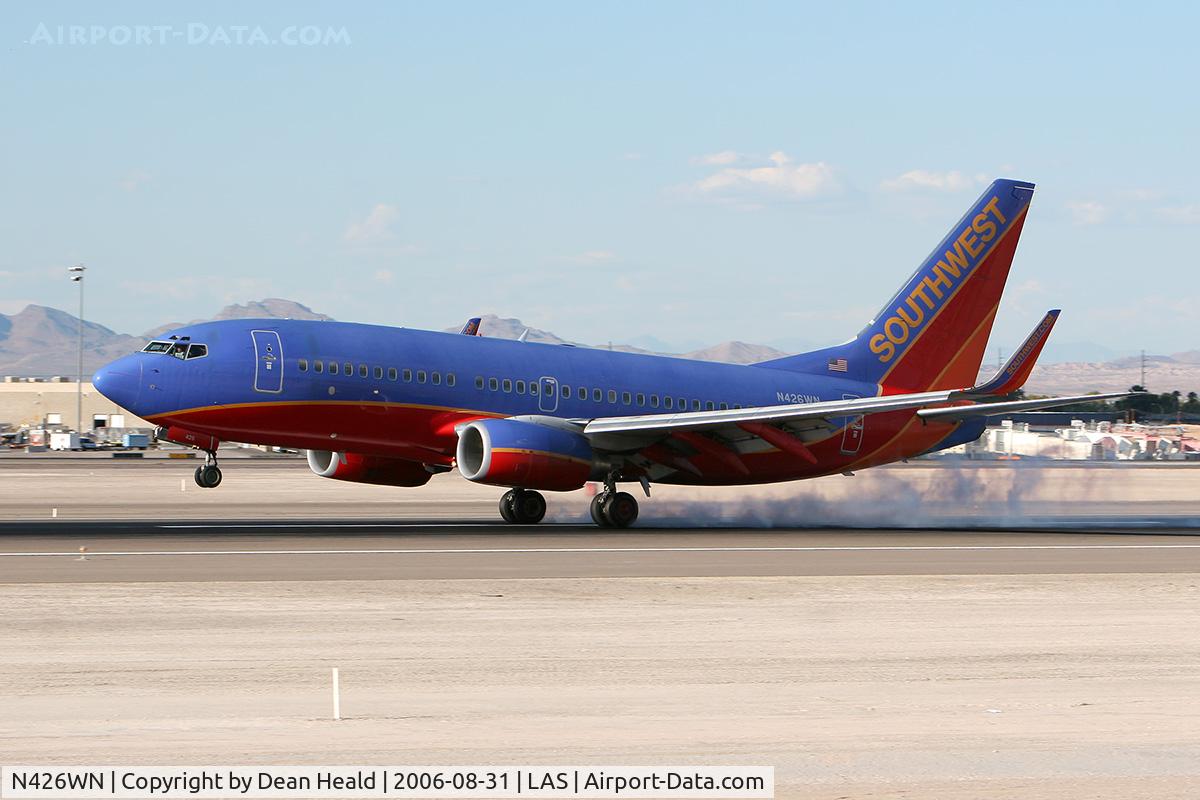 N426WN, 2002 Boeing 737-7H4 C/N 29830, Southwest Airlines N426WN (FLT SWA2014) from Phoenix Sky Harbor Int'l (KPHX) touching down on RWY 25L.