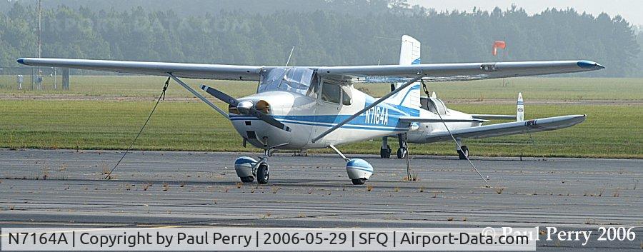 N7164A, 1956 Cessna 172 C/N 29264, Prior to her activity in the afternoon, parked on the hazing morning
