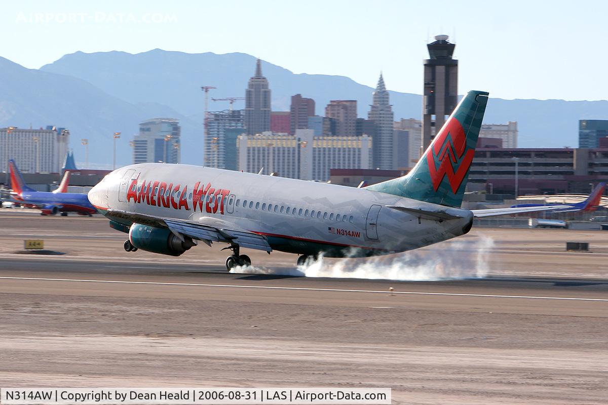 N314AW, 1987 Boeing 737-3S3 C/N 23733, America West N314AW (FLT AWE113) from Dallas Ft Worth Int'l (KDFW) touching down on RWY 25L.