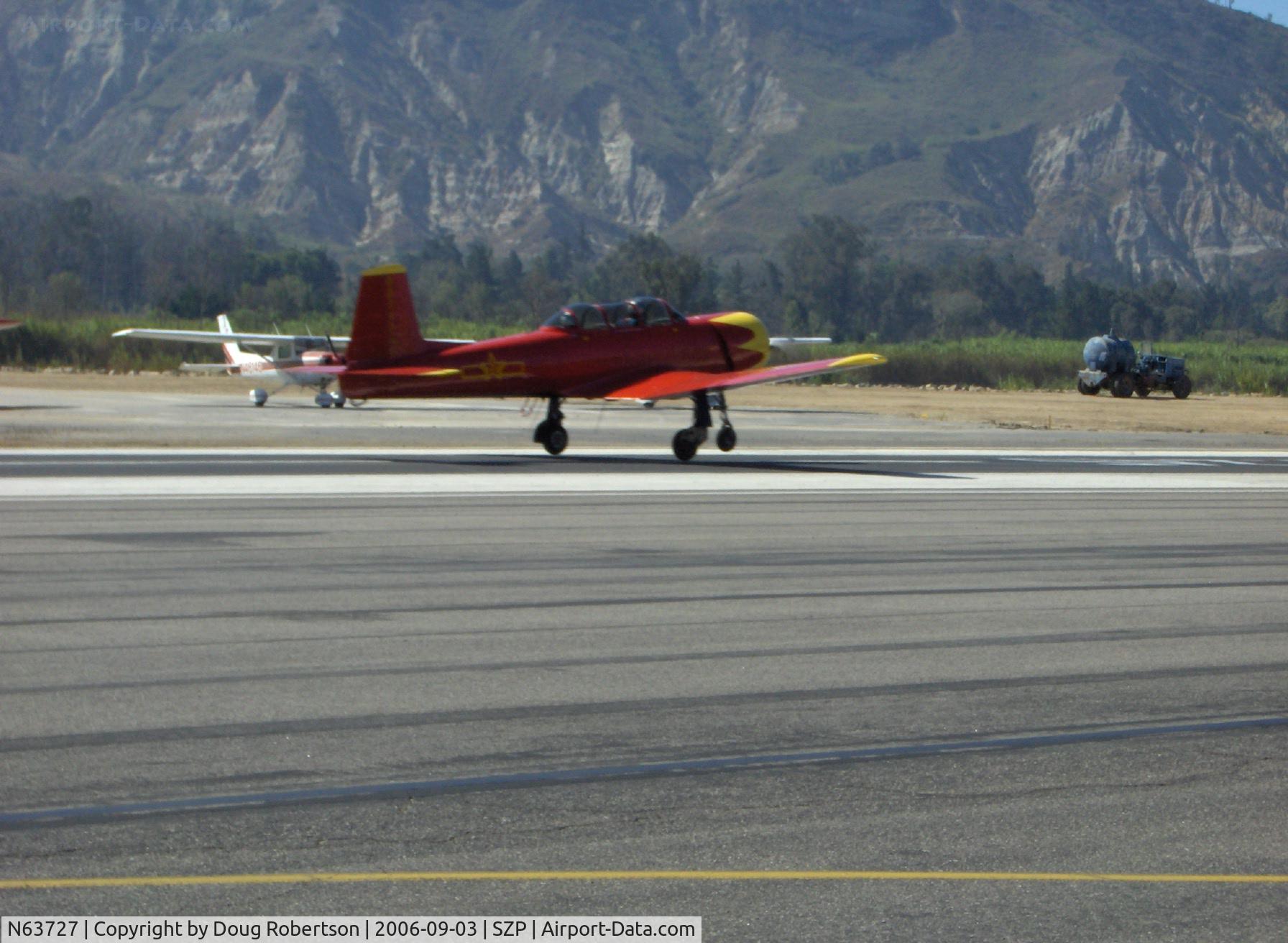 N63727, 1977 Nanchang CJ-6A C/N 1832035, 1977 Nanchang China CJ-6A, Huosai 6A 9 cylinder radial 285 Hp, liftoff Runway 22