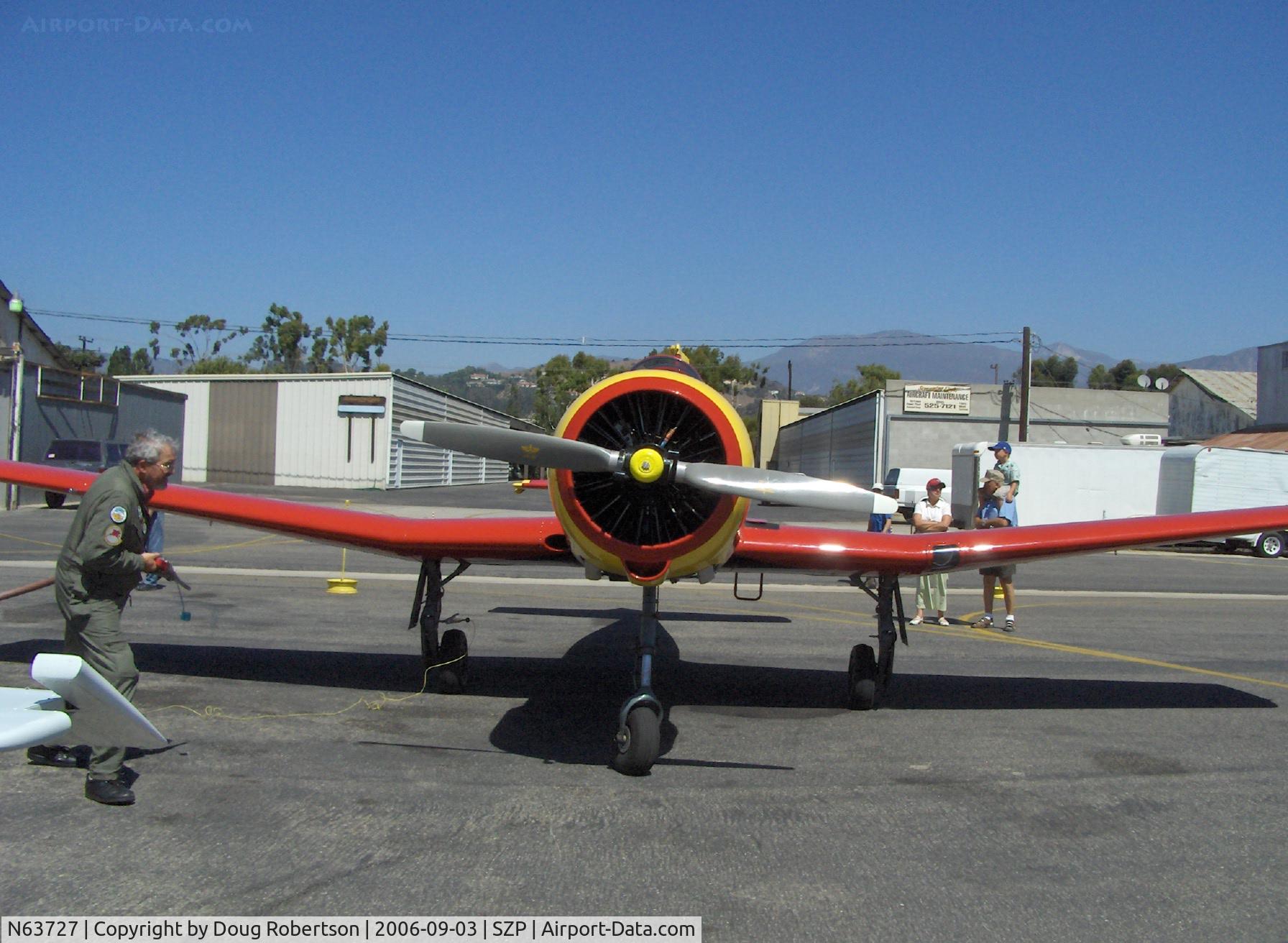 N63727, 1977 Nanchang CJ-6A C/N 1832035, 1977 Nanchang China CJ-6A, Huosai 6A 9 cylinder radial 285 Hp, refueling, note bonding wire for anti-spark safety