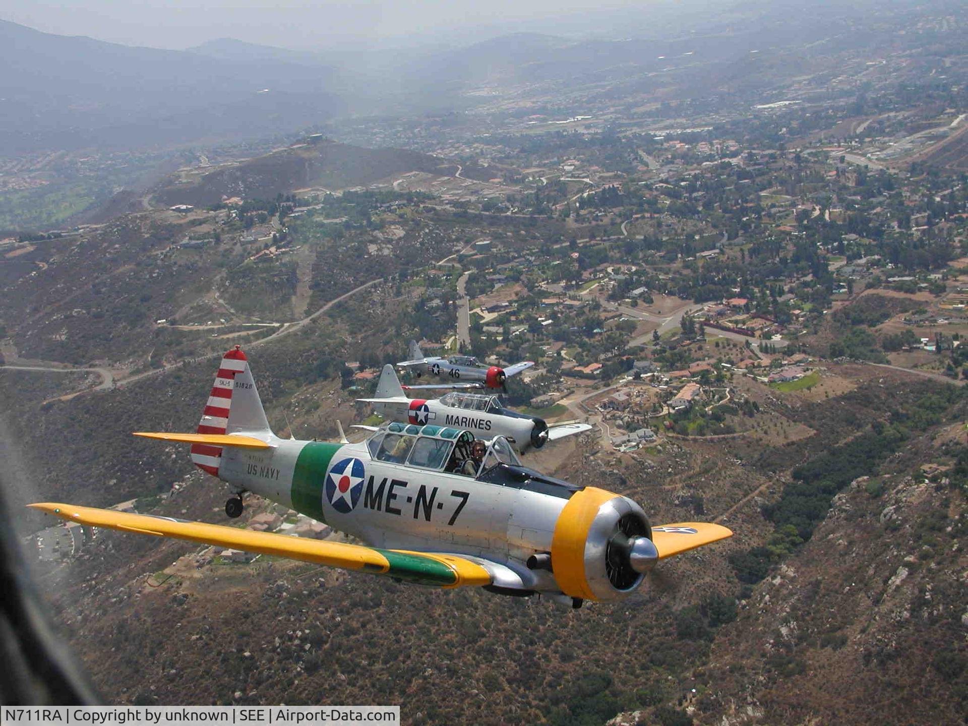 N711RA, 1943 North American SNJ-5C Texan Texan C/N 88-14800, Formation flying