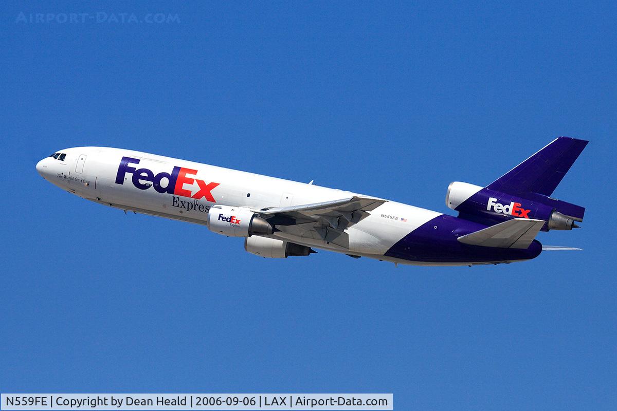 N559FE, 1973 McDonnell Douglas MD-10-10F C/N 46930, Fed Ex N559FE (FLT FDX3012) climbing out from RWY 25R enroute to Chicago Ohare Int'l (KORD).