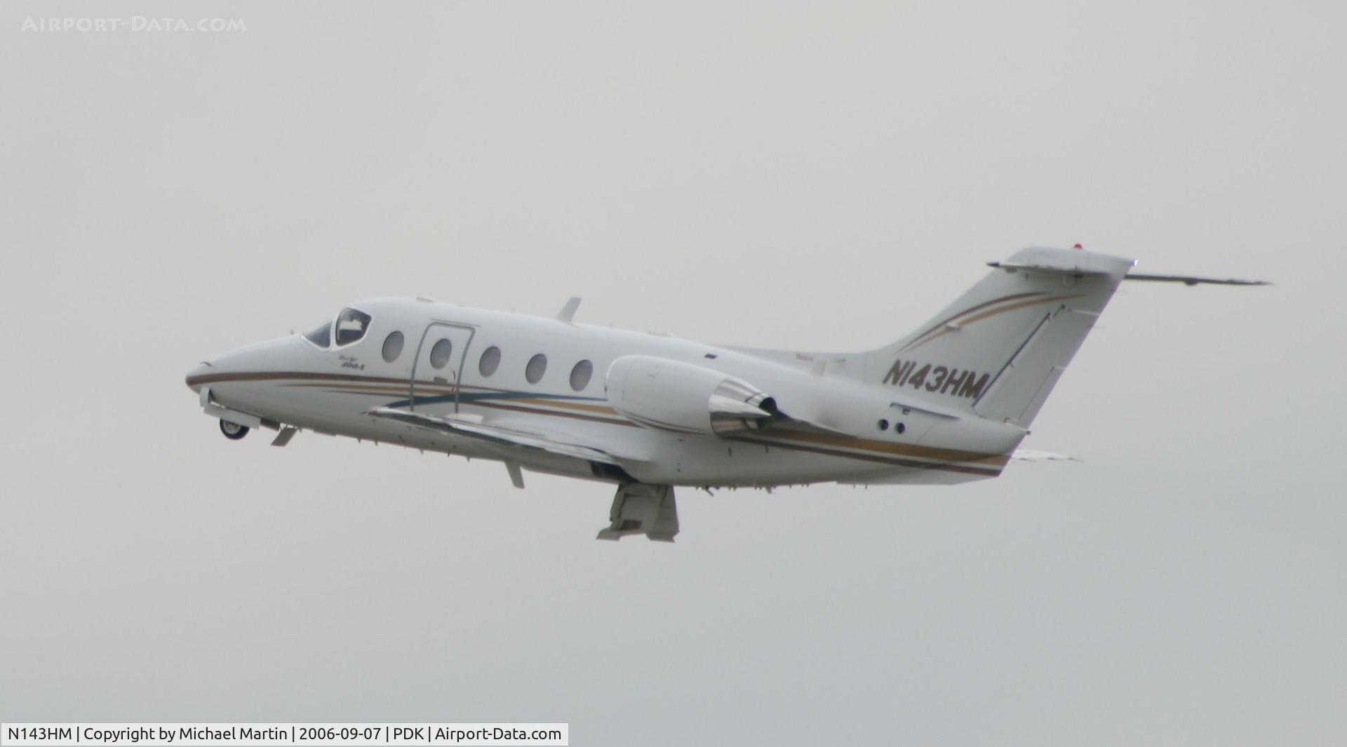 N143HM, 1998 Raytheon Aircraft Company 400A C/N RK-205, Departing 2R - Gear Up!