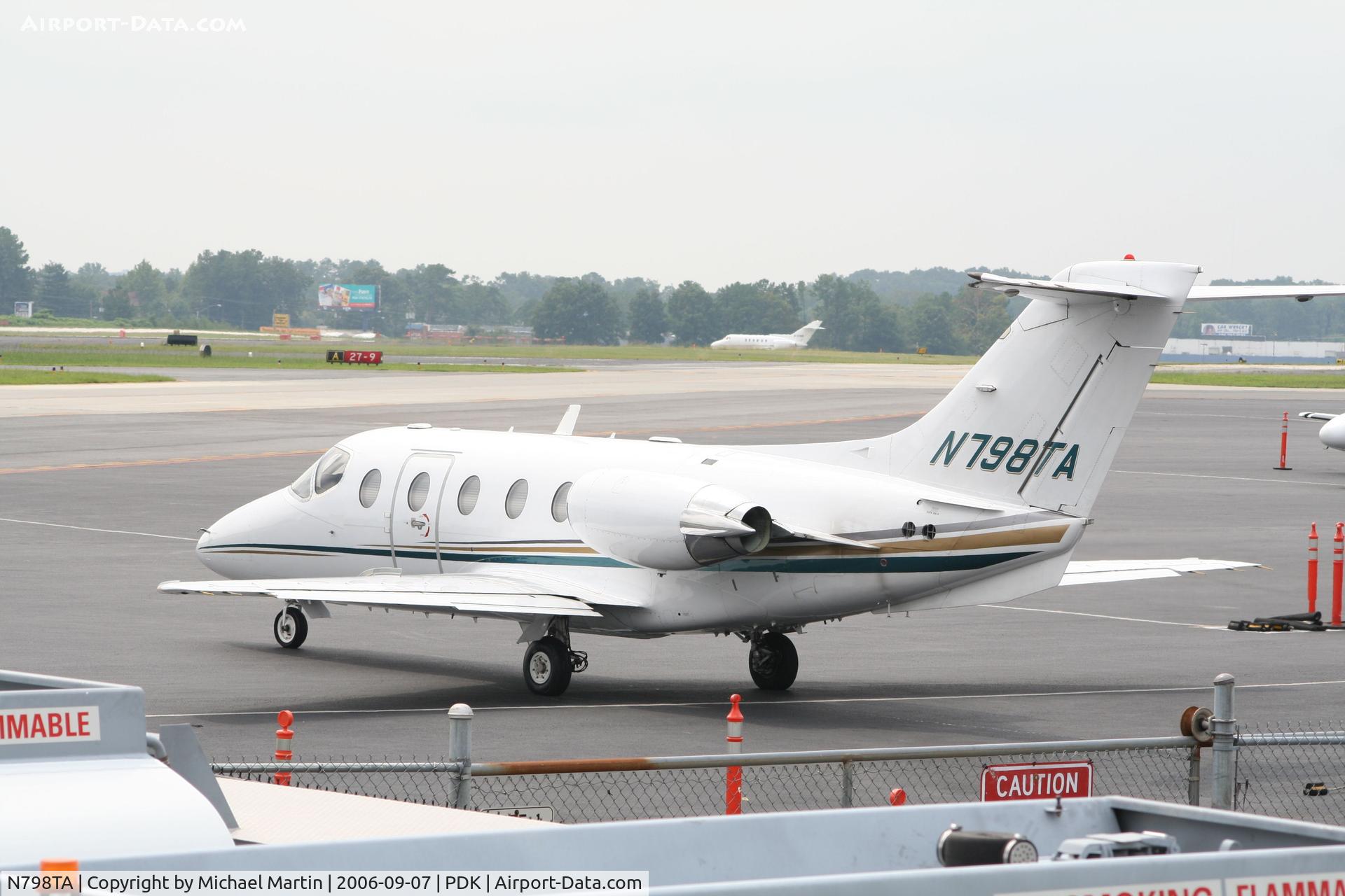 N798TA, 1998 Raytheon Beechjet 400A C/N RK-198, Tied Down @ Mercury Air Center with other A/C