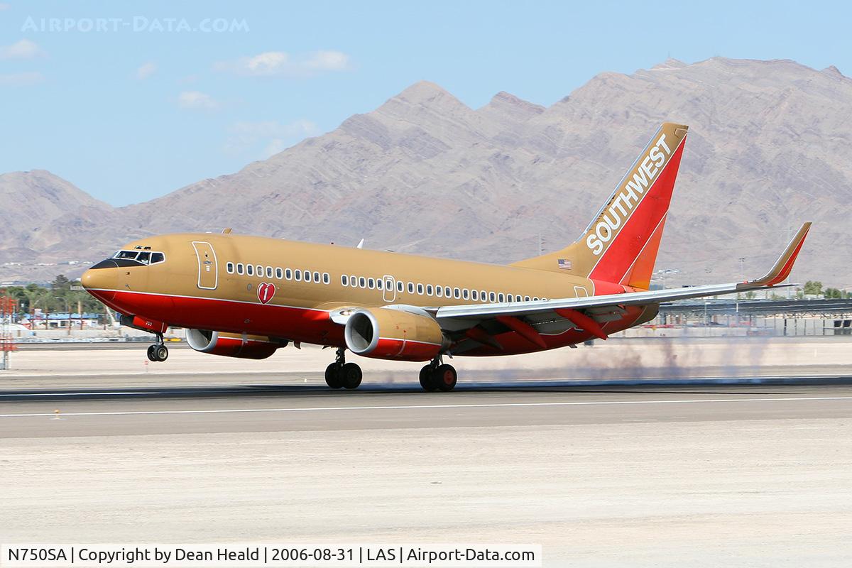 N750SA, 1999 Boeing 737-7H4 C/N 29802, Southwest Airlines N750SA touching down on RWY 25L.