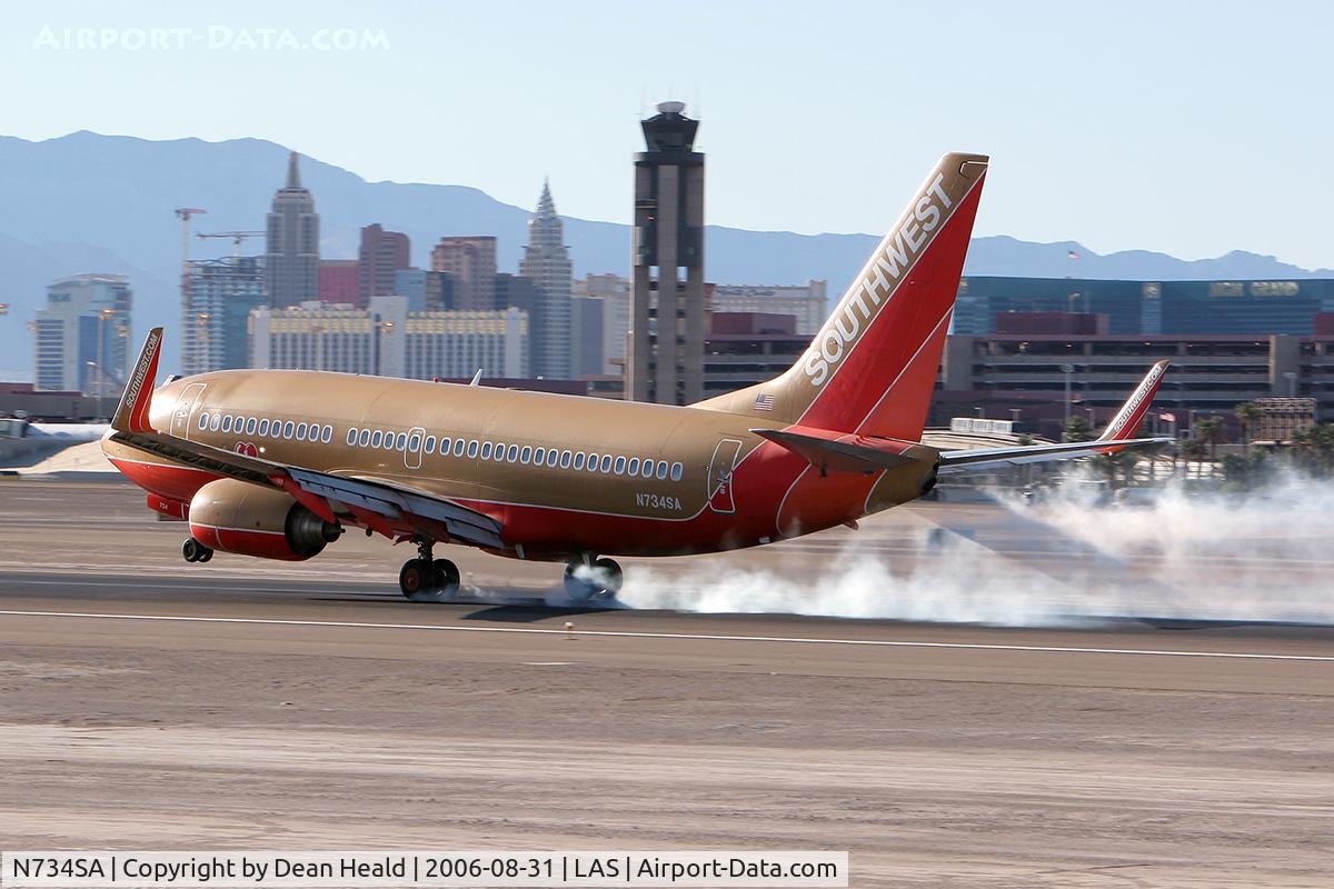 N734SA, 1999 Boeing 737-7H4 C/N 27866, Southwest Airlines N734SA touching down on RWY 25L.