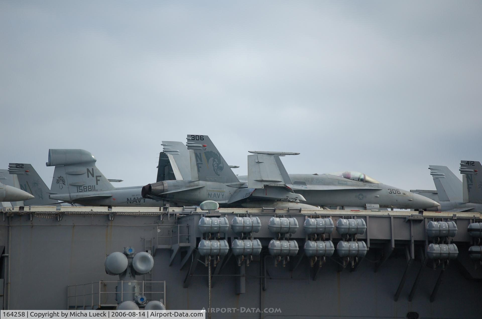 164258, 1991 McDonnell Douglas F/A-18C Hornet C/N 1021/C239, McDonnell Douglas F/A 18E Super Hornet (c/n 166425) in the background. In the middle is Grumman EA-6B Prowler G-128, and in the front is McDD F/A 18C Hornet (c/n 164258)