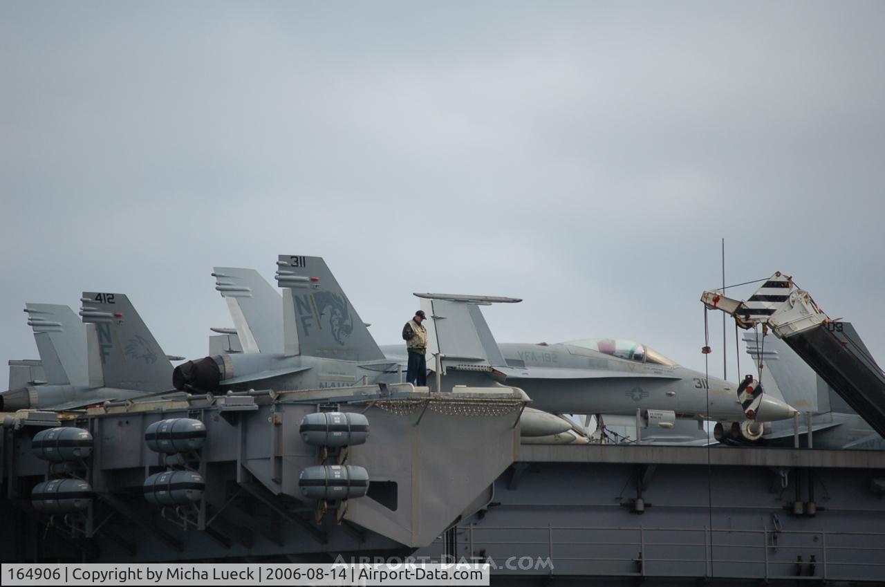 164906, McDonnell Douglas F/A-18C Hornet C/N 1238/C365, McDonnell Douglas F/A 18C Hornets (412, c/n 164906; 311, c/n 163772) on the Kitty Hawk in Fremantle, Australia