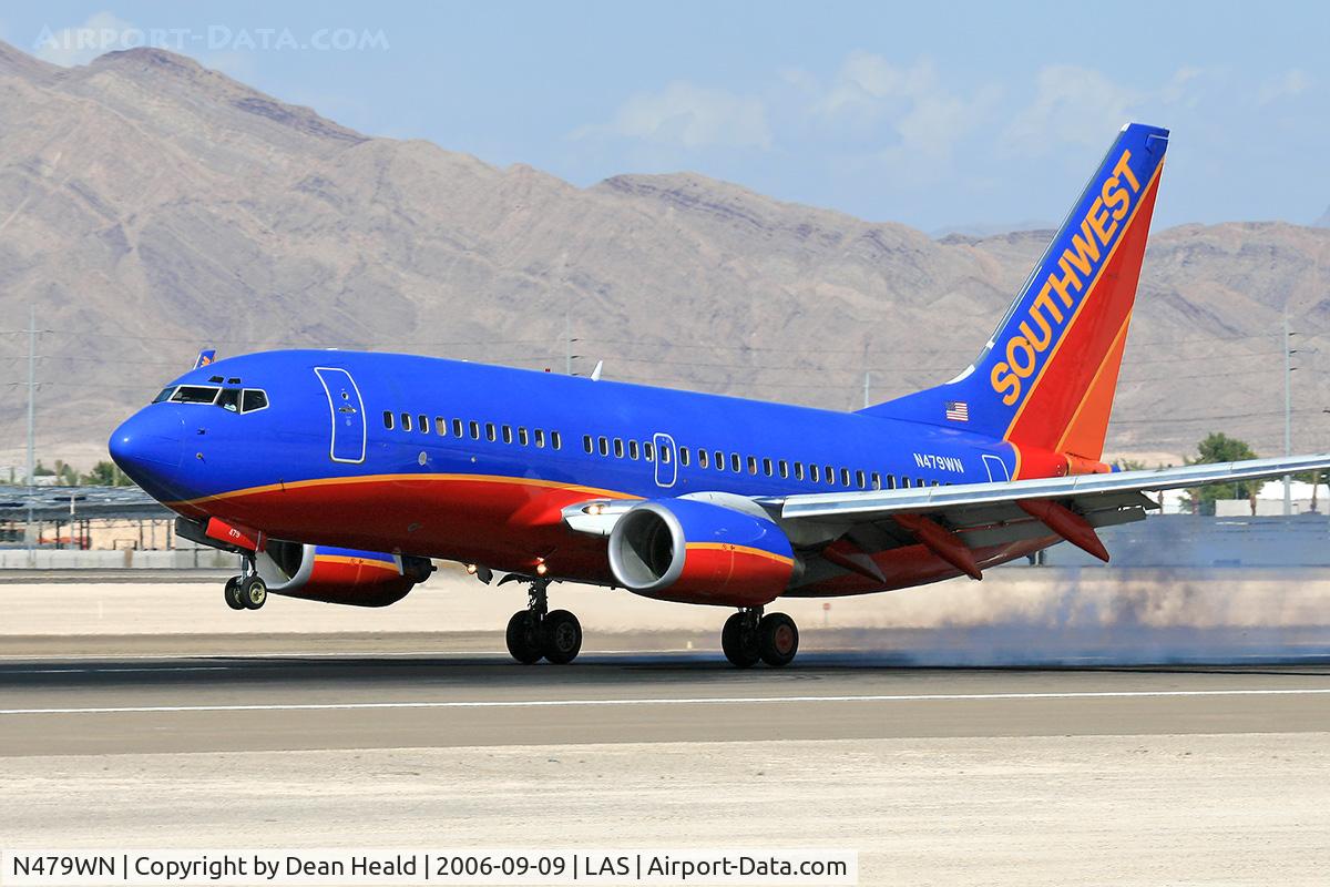 N479WN, 2004 Boeing 737-7H4 C/N 33990, Southwest Airlines N479WN (FLT SWA2474) from Raleigh Durham Int'l (KRDU) touching down on RWY 25L.